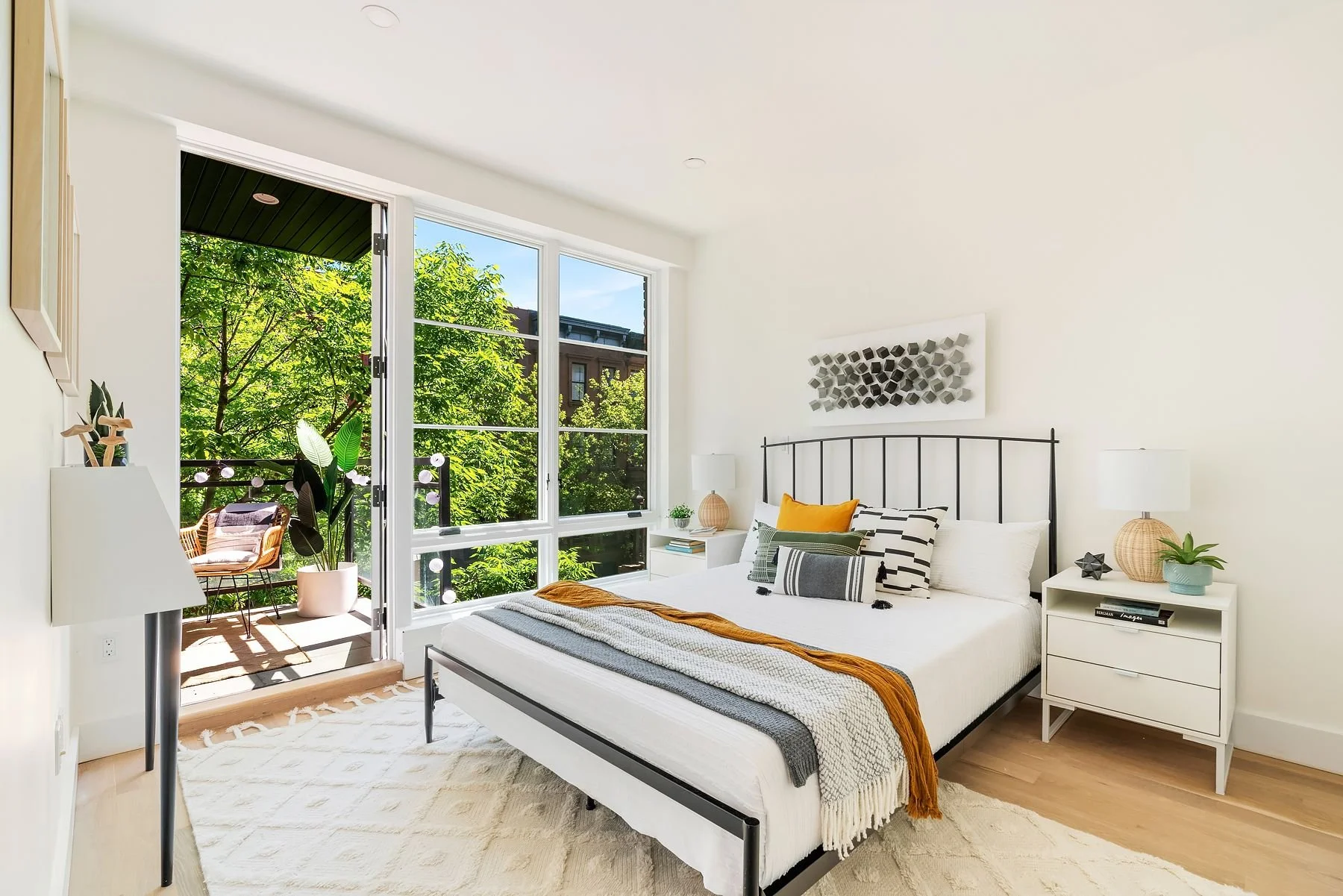  Residences at the boutique brick-and-glass condominium feature five-inch, white oak flooring throughout; eight-foot-high Pella Windows that flood residences with natural light; in-unit, vented washers and dryers; double width closets; and modern, op