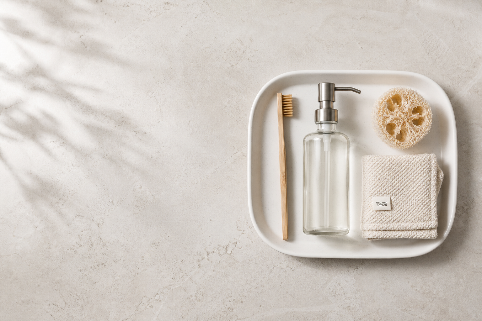 Minimalist bathroom essentials on a neutral background