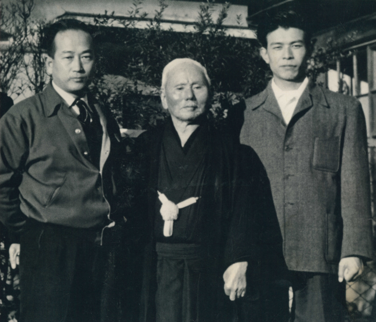 Master Masatoshi Nakayama, Master Gichin Funakoshi, and Master Teruyuki Okazaki