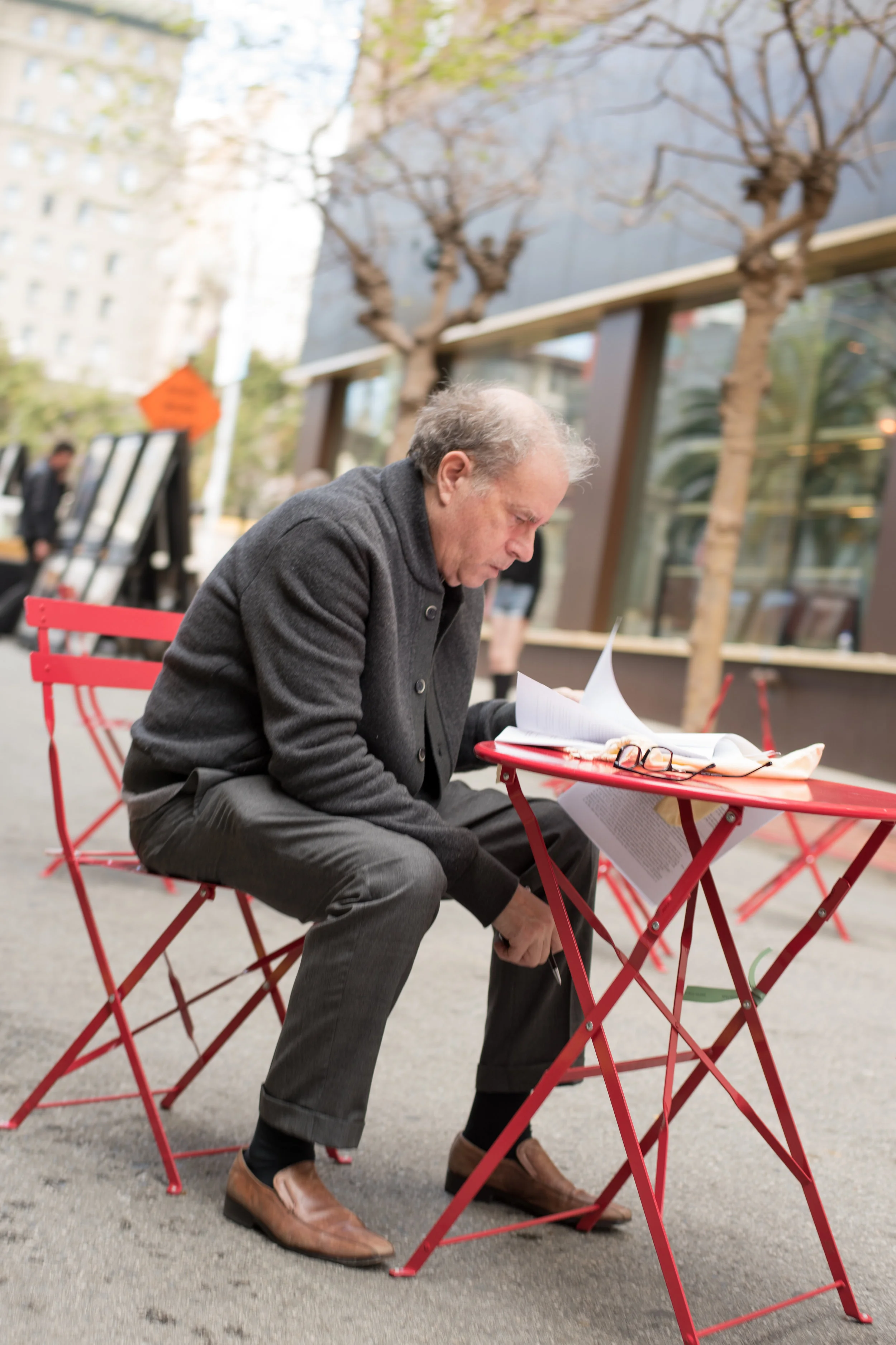 Man on Red Table_Powell_3-2017.jpg