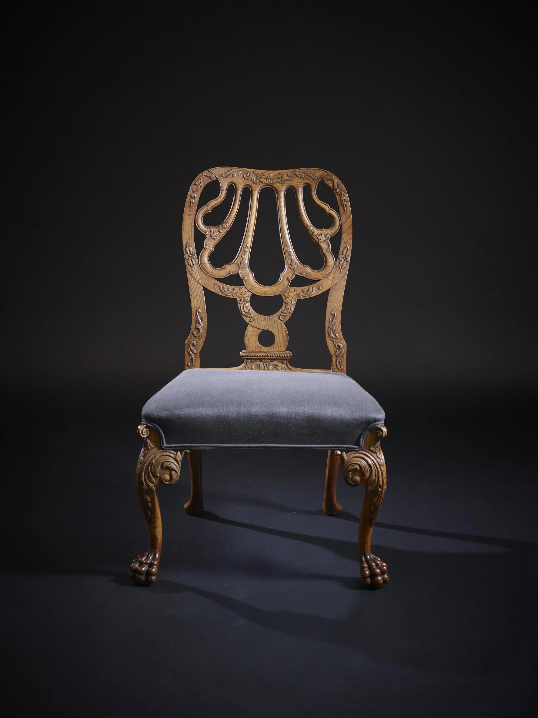 A 19th century oak side chair after a design attributed to Giles Grendy