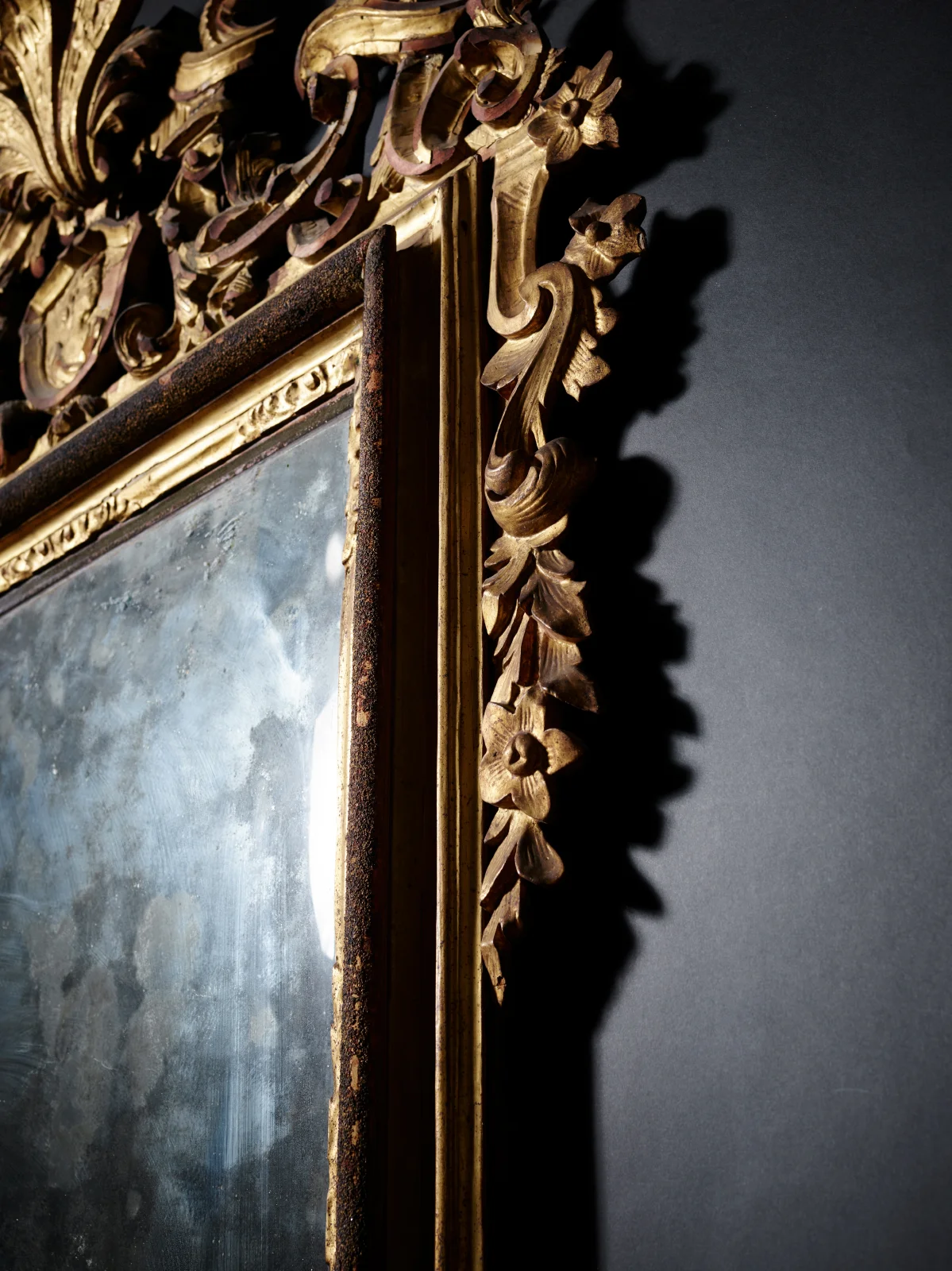 An Italian carved and giltwood mirror