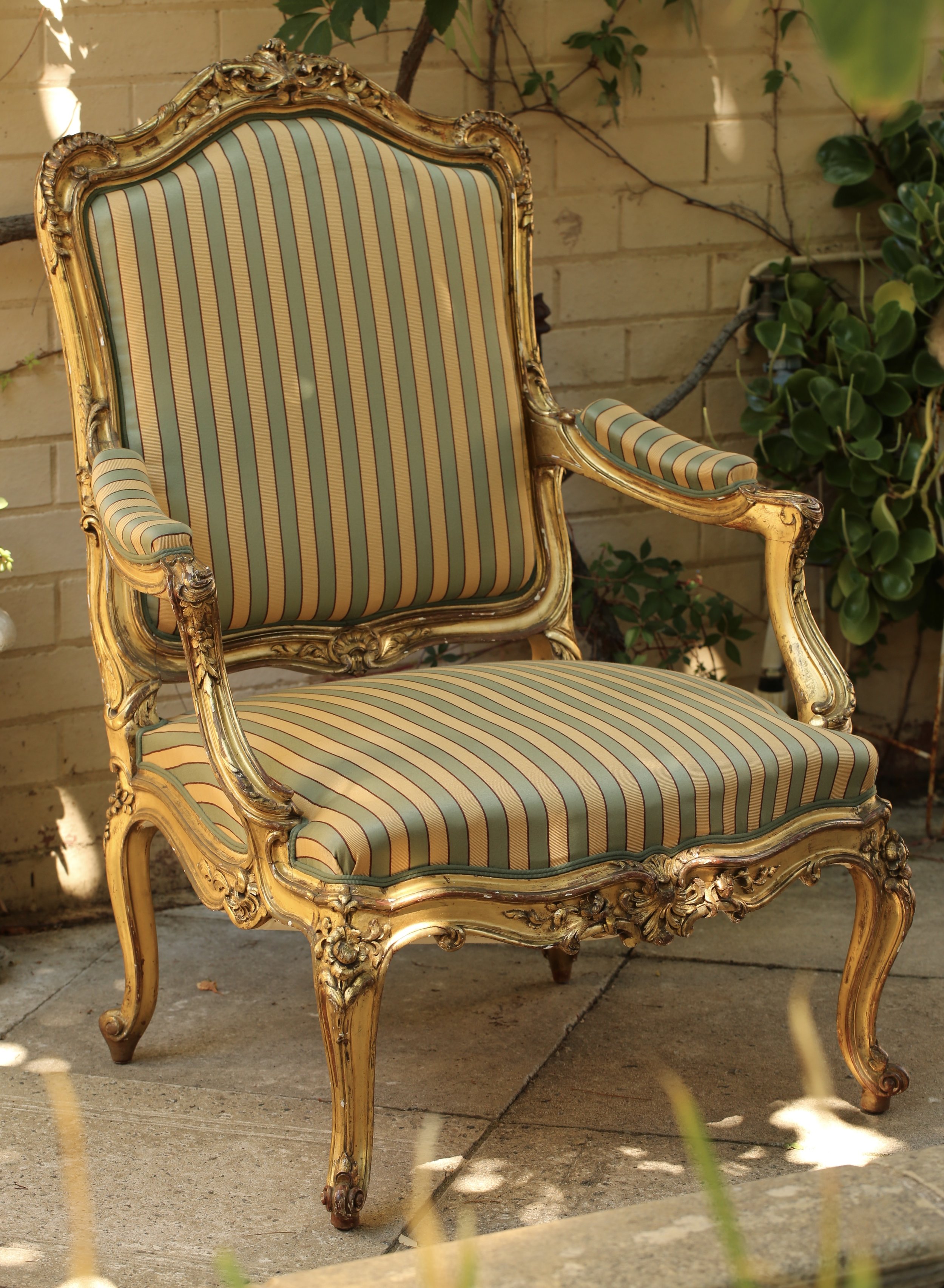 Louis XV style giltwood armchair