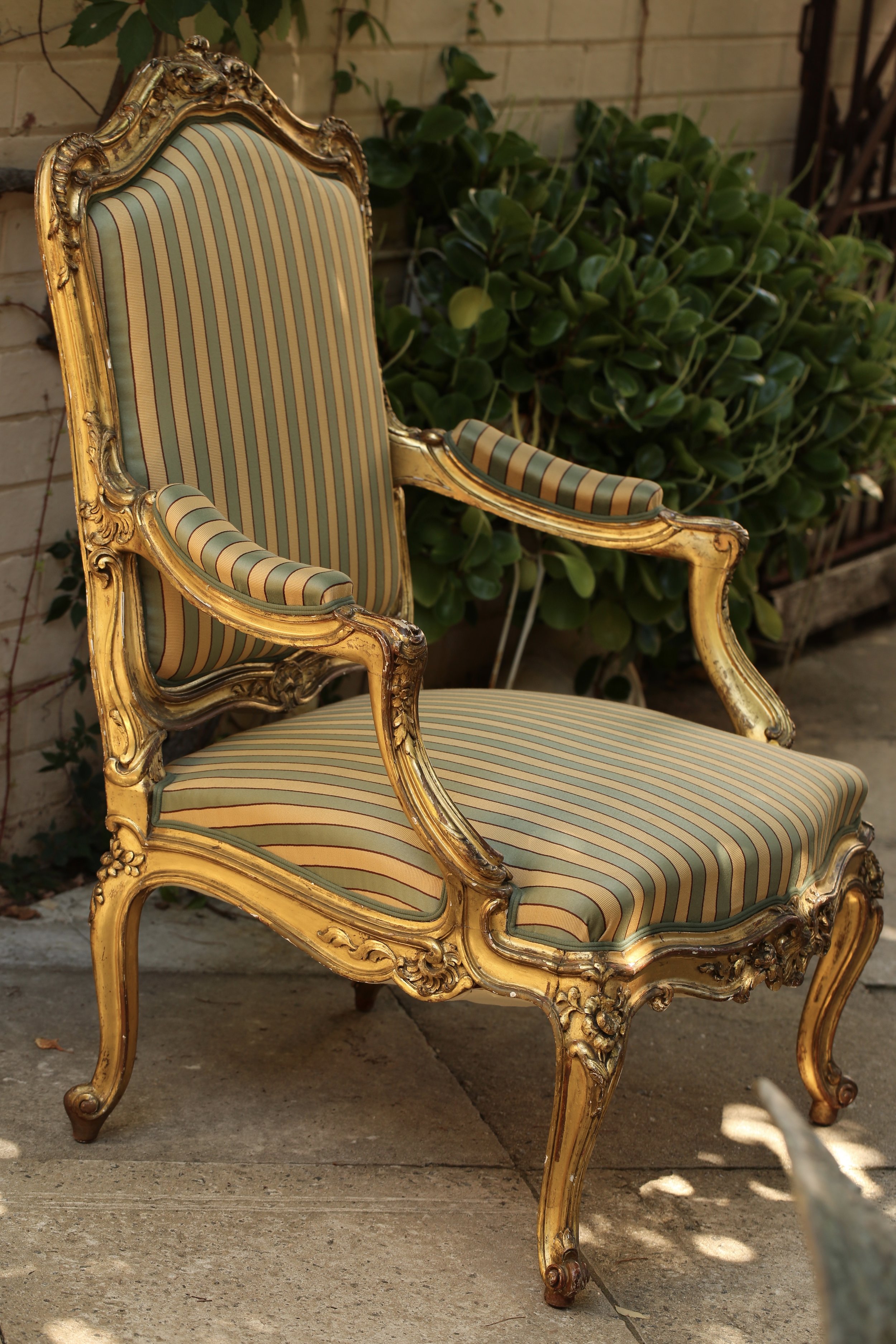 Giltwood Louis XV fauteuil (armchair) with neoclassical details 1765 (via  Mallett Antiques)