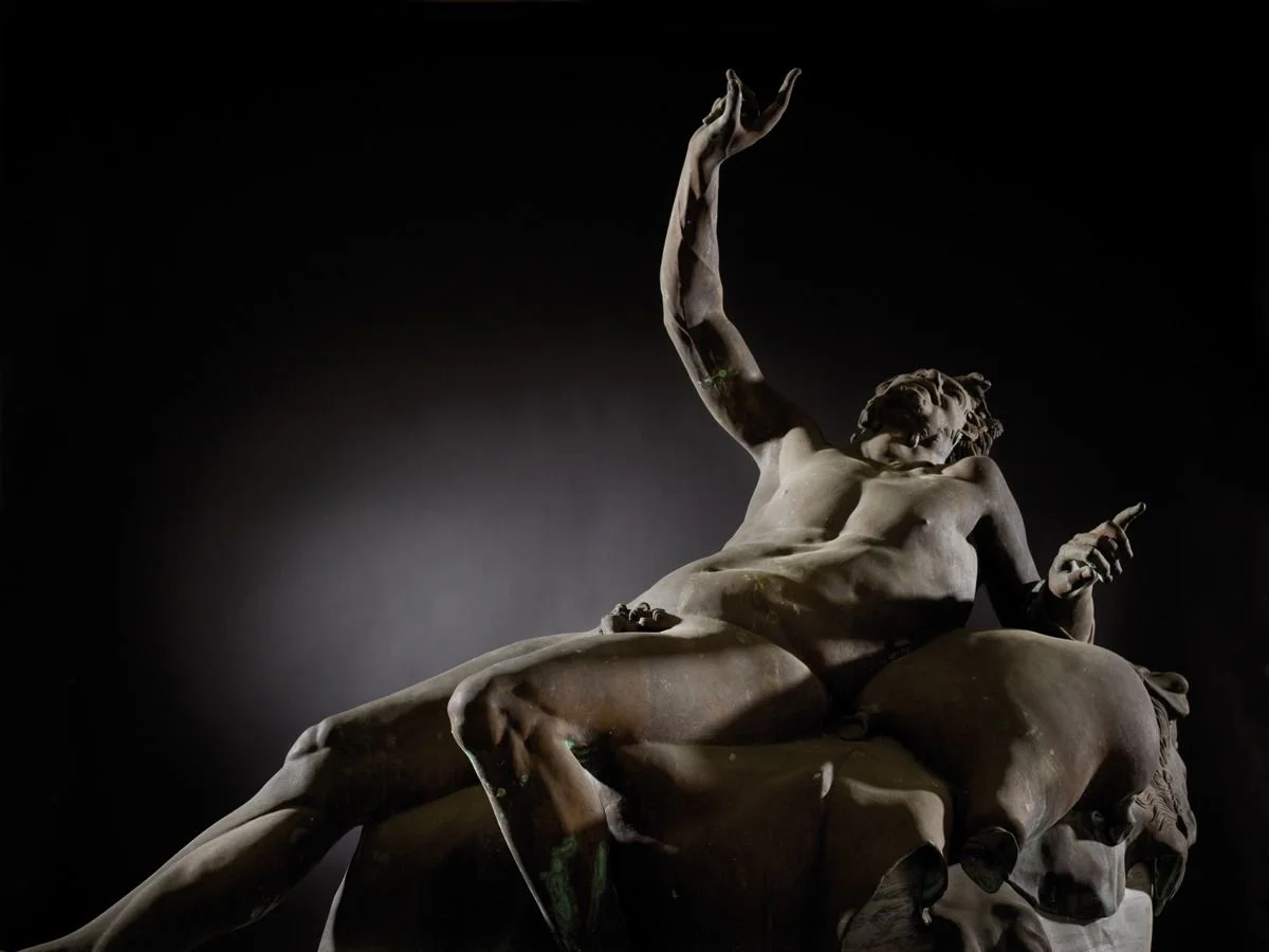 Life size Italian bronze figure of a drunken satyr