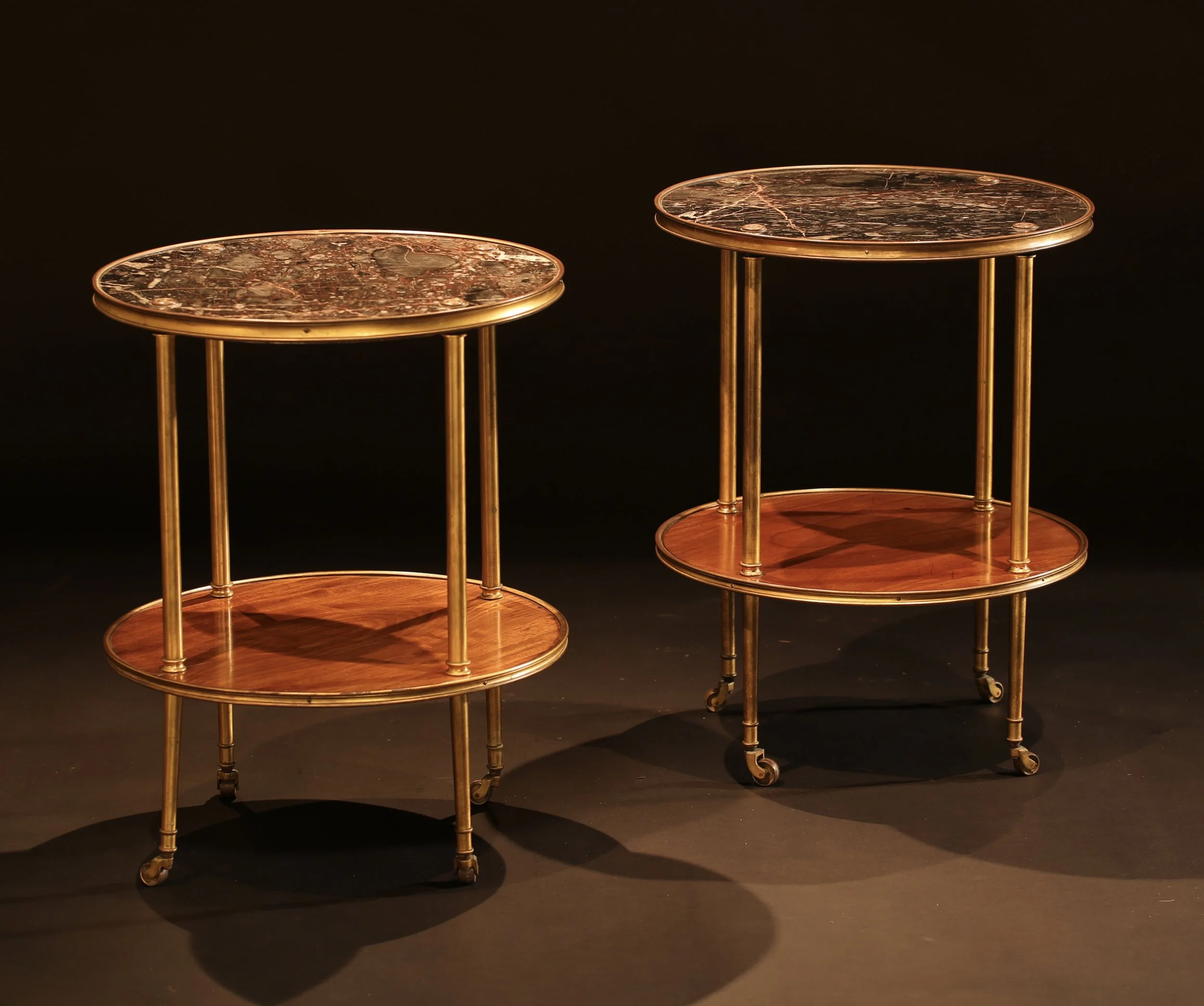 A pair of elegant occasional tables