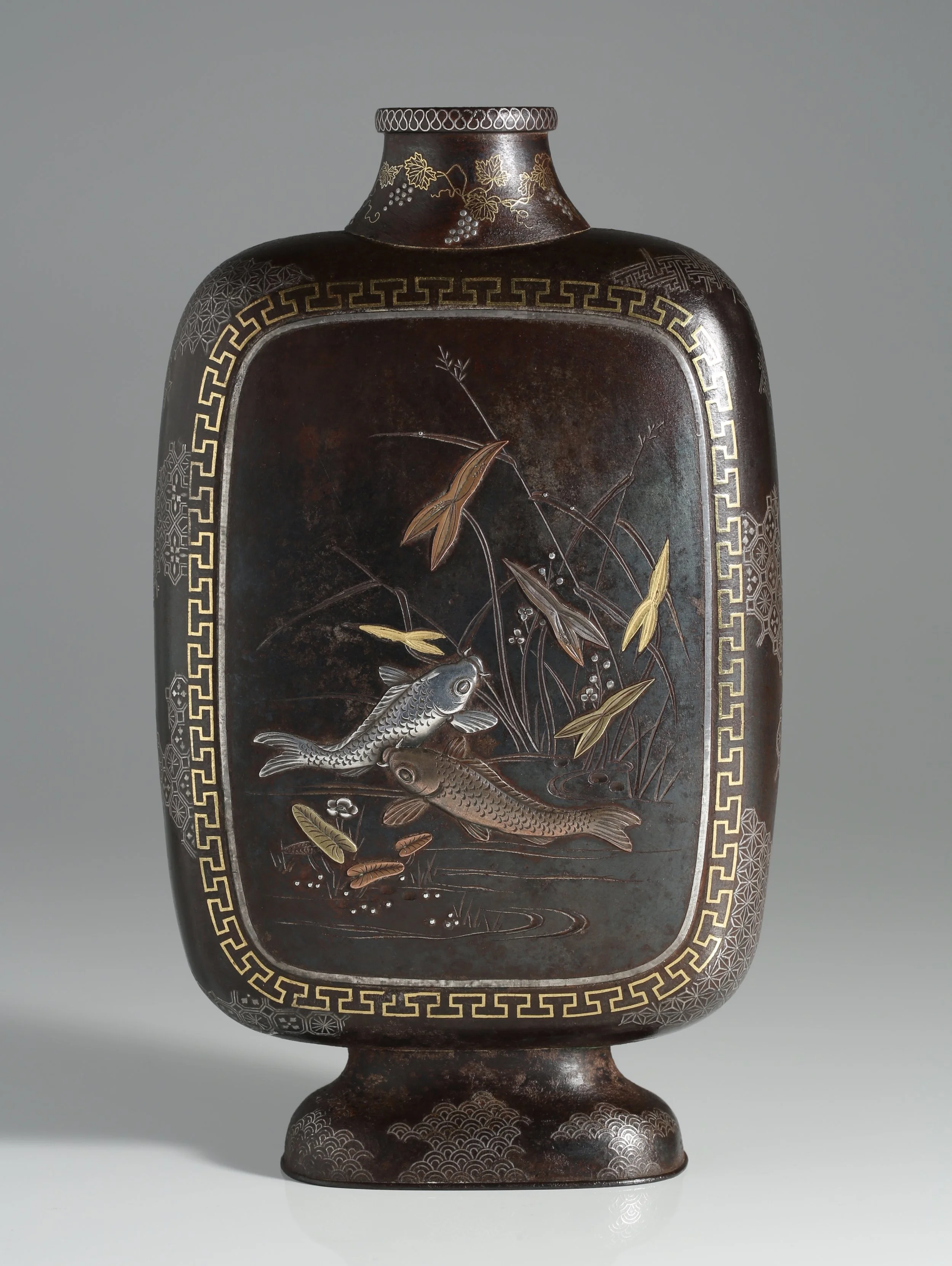 Inlaid iron vase