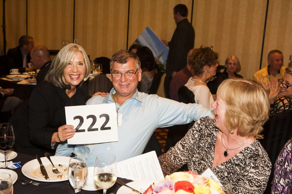 April Brown Auctioneer with Bidder #222