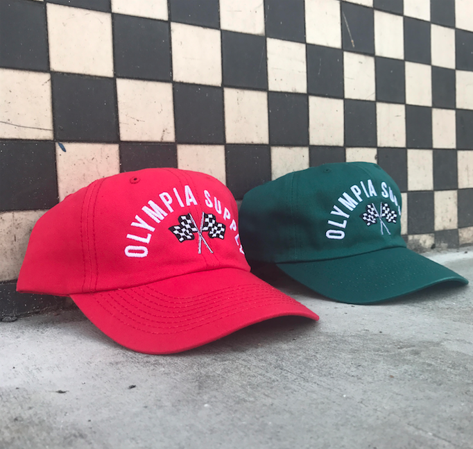 New "Speedway" Unstructured 6-Panel strap back hat. Available in red & spruce. 