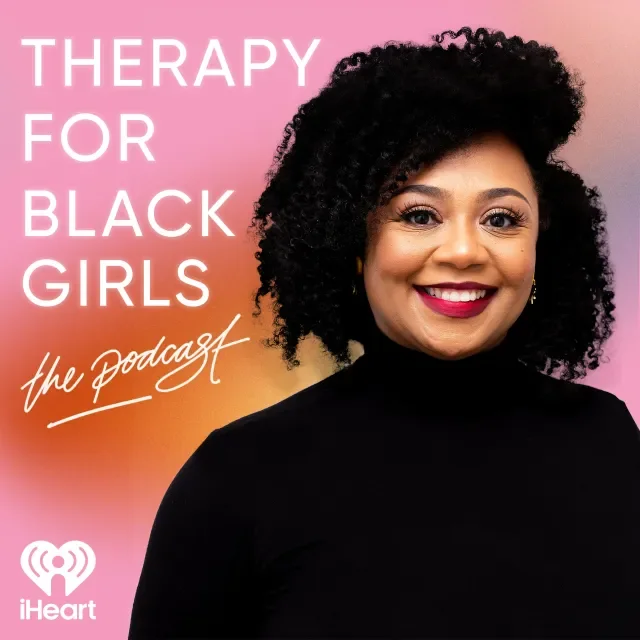 Cover of podcast titled "Therapy for Black Girls", with DR. Joy Bradford. A smiling Black woman with curly hair, wearing a black top, standing against a pink and orange gradient background.