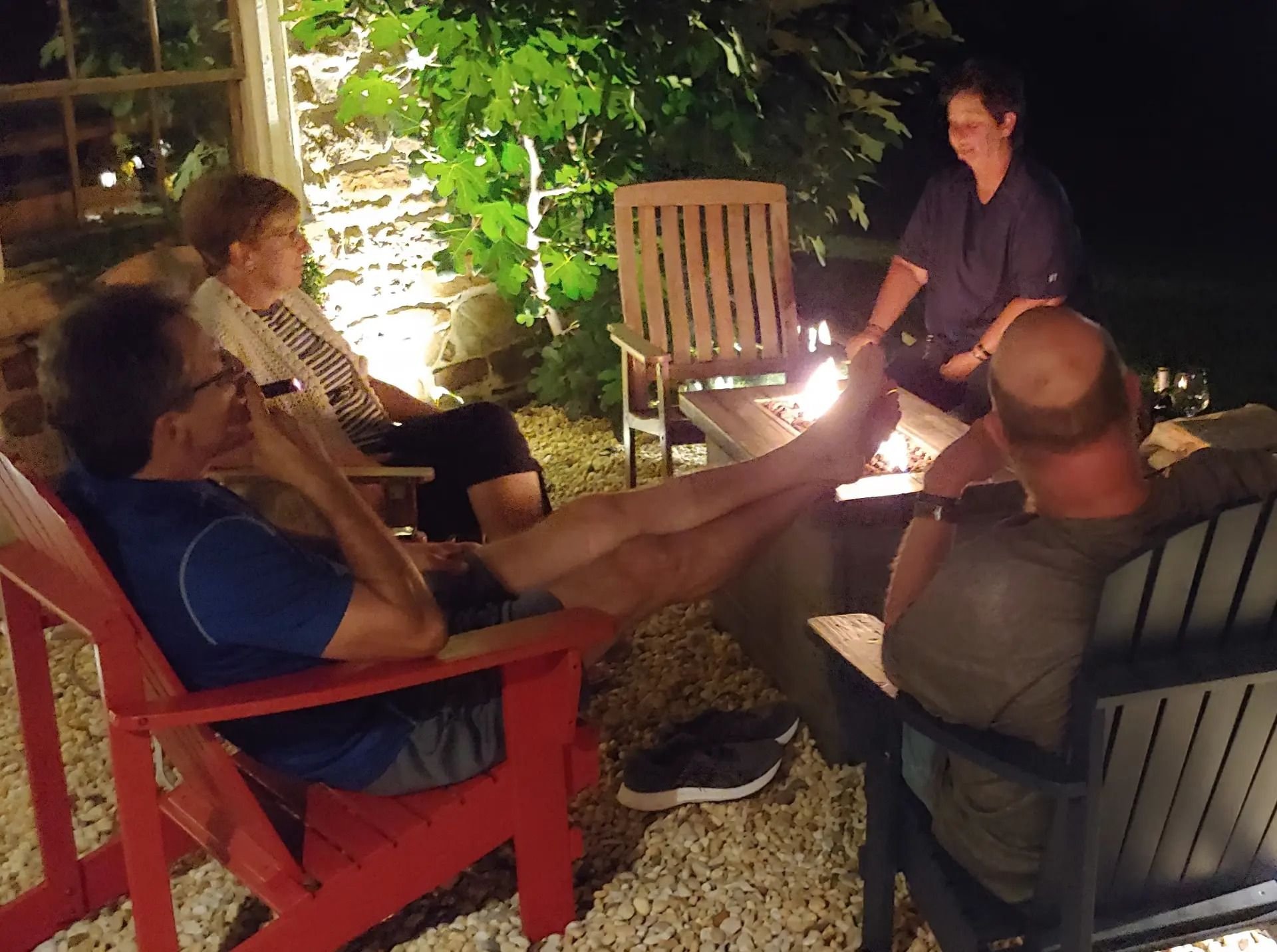 Couples enjoy the fire table