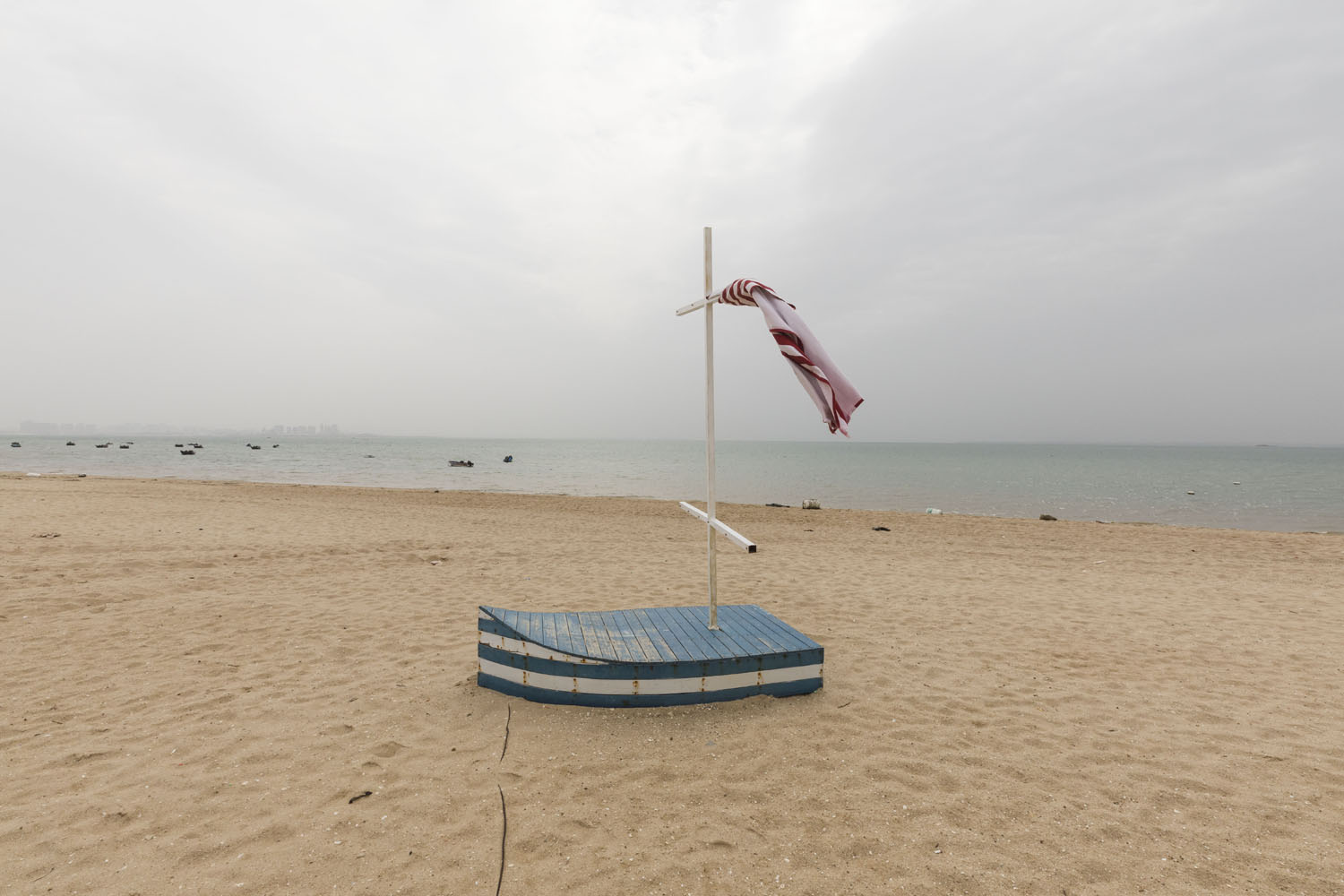 An oversized toy boat used for wedding photography at Guanyinshan Fantasy Beach. Xiamen, China. 2018.