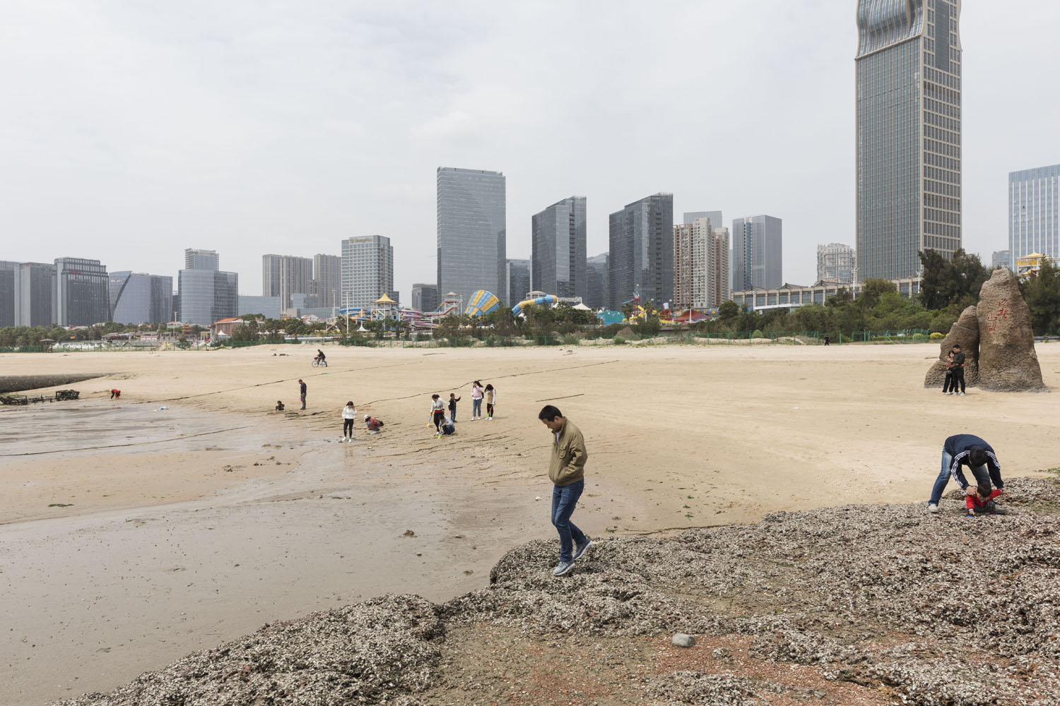 Beach goers at Guanyinshan Fantasy Beach. Xiamen, China. 2018.