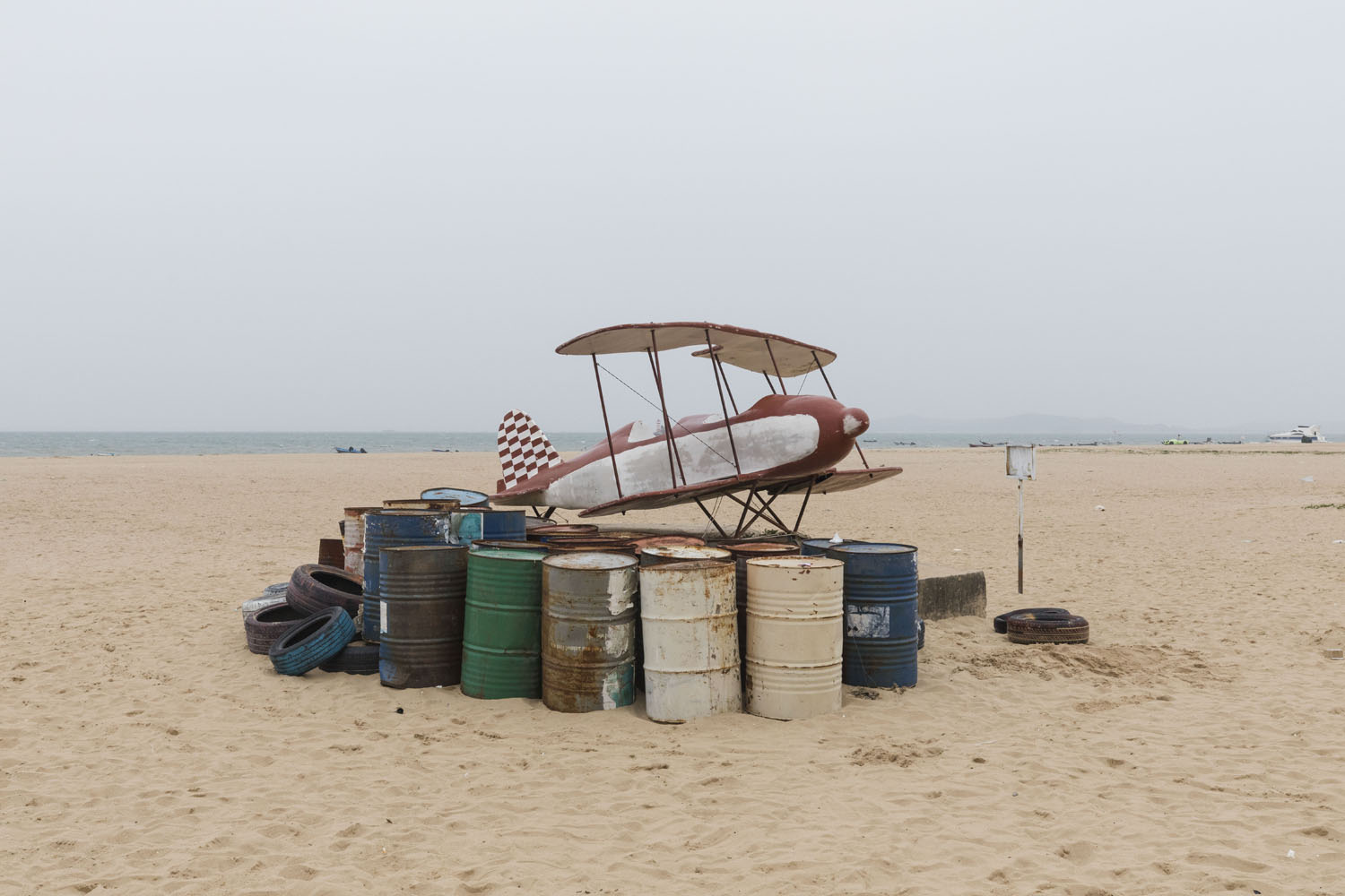 An imitation biplane used for wedding photography at Guanyinshan Fantasy Beach. Xiamen, China. 2018.