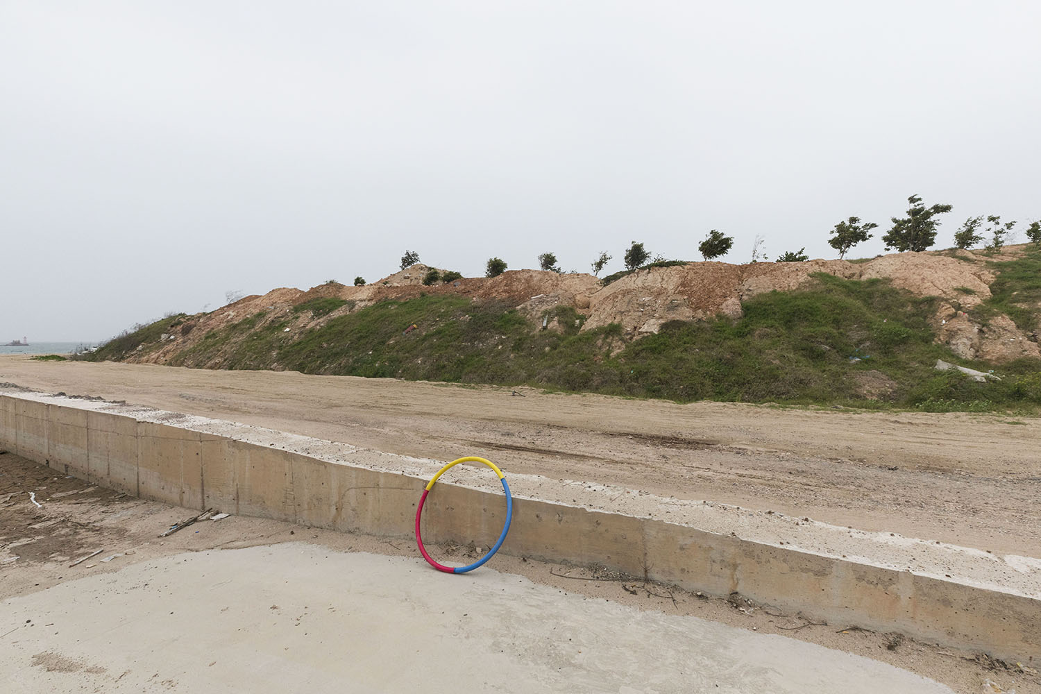A hoola-hoop at Guanyinshan Fantasy Beach. Xiamen, China. 2018.