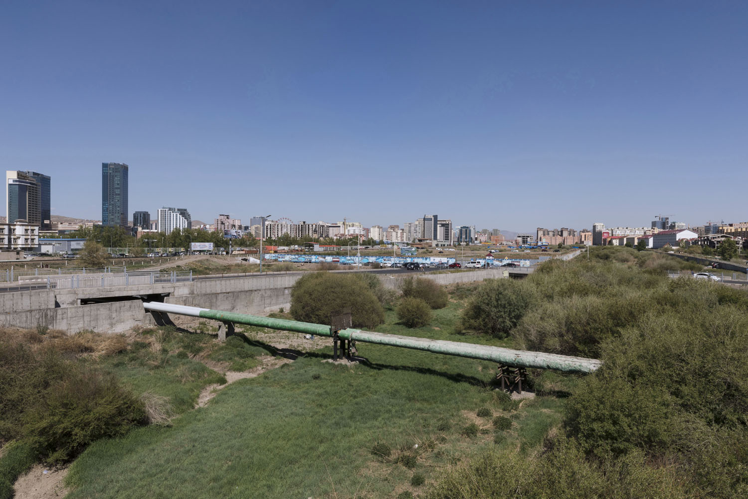 Pipeline that crosses the Selbe River. Ulaanbaatar, Mongolia. 2018.