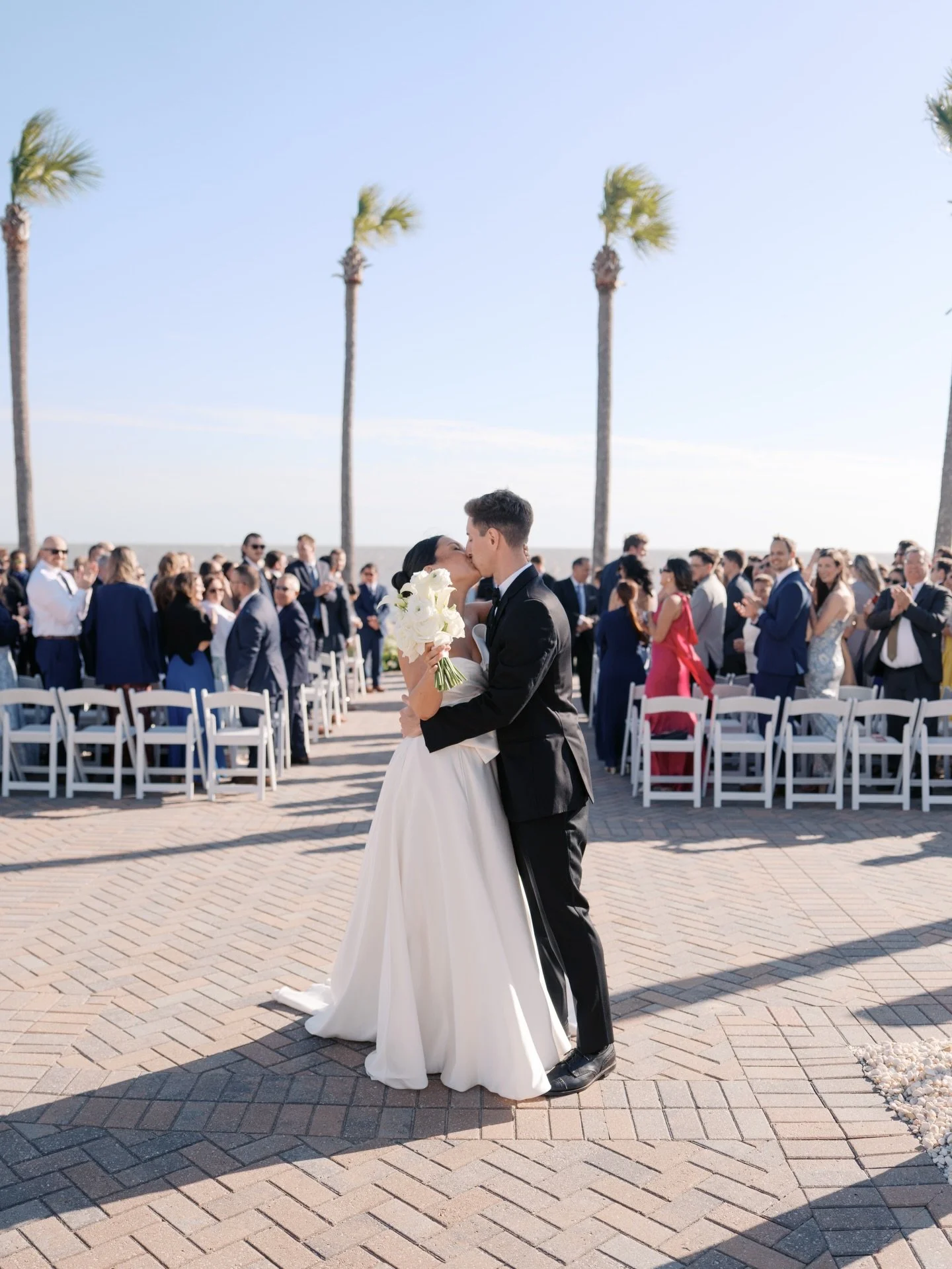 // one of the windiest days I&rsquo;ve ever had photographing a wedding and it only added to the vibe for this dream team! Congrats, Sophia and Jake! Y&rsquo;all are the best.

Venue: @seabrookweddings 
Planning: @everythingafterthering 
Florist: @ev
