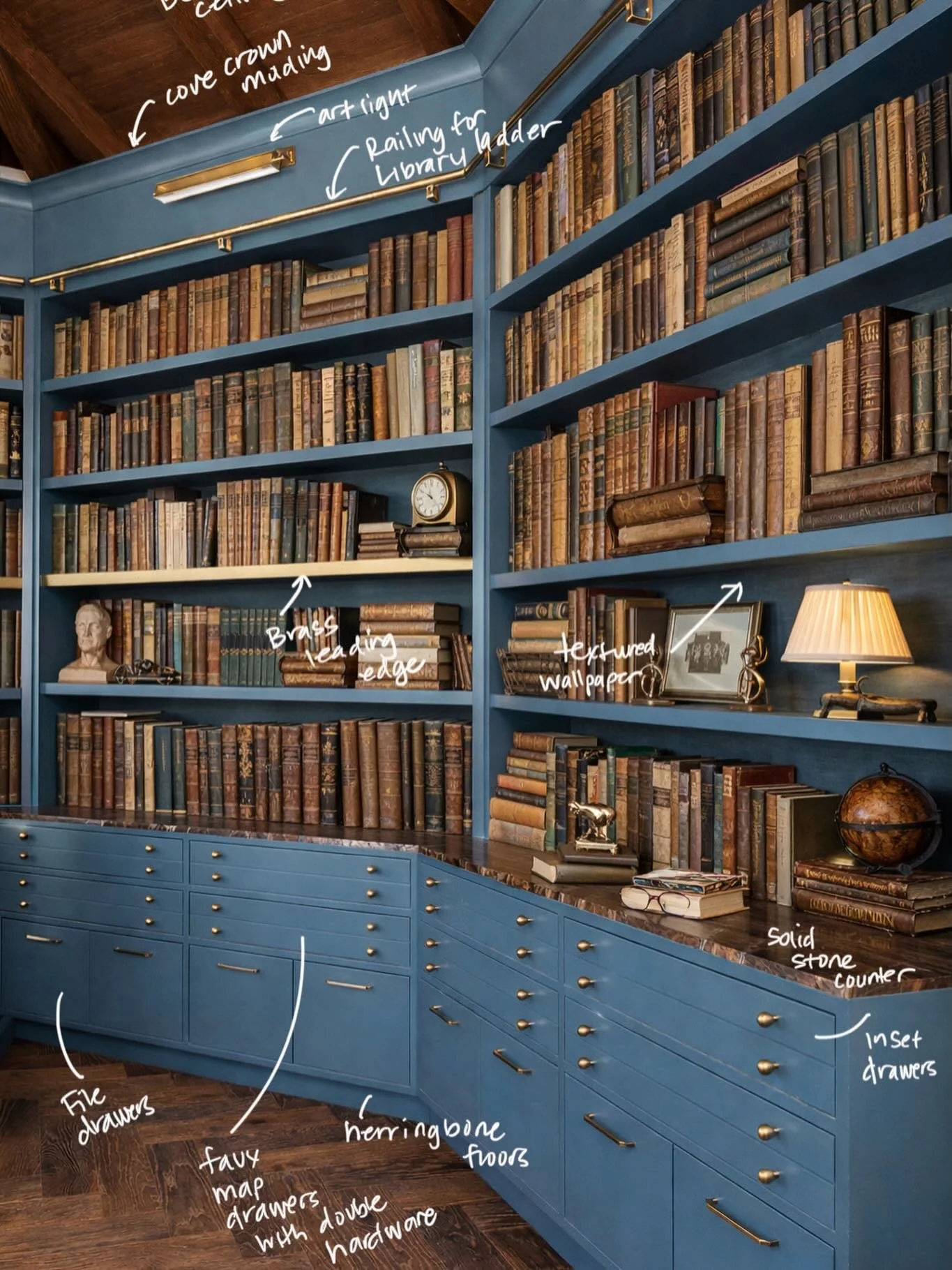 We set out to create a library that feels like it belongs in a storybook.

Floor to ceiling shelving, deep saturated walls, warm layered lighting, and rich textures bring that cinematic, old world mood. A worn leather chair, velvet upholstery, and co
