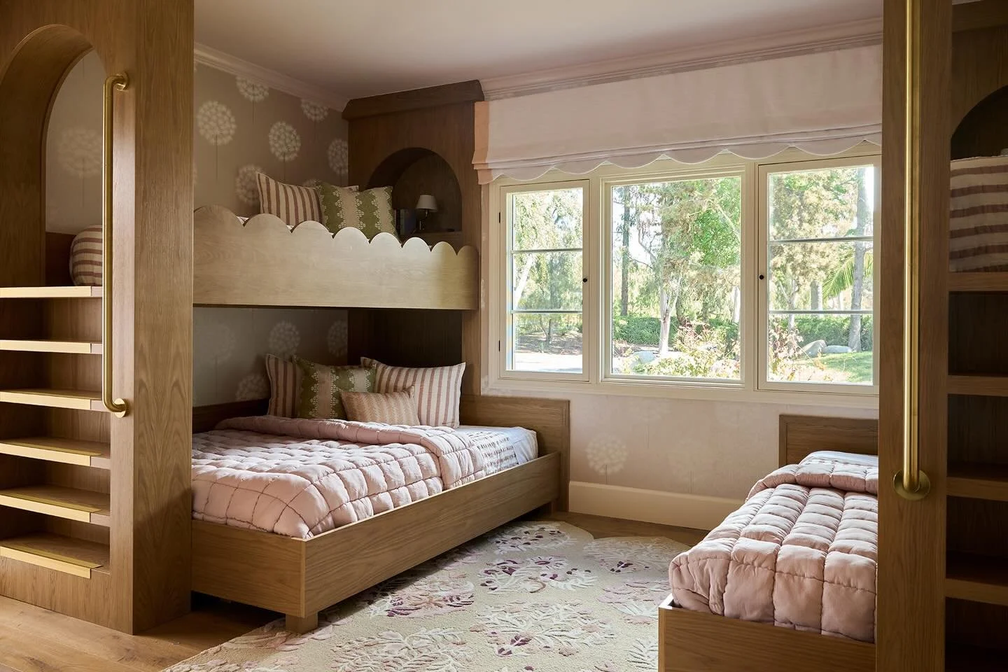 Custom bunks, twin over queens, scalloped railing and scalloped valance. 

When you invest in custom, you get to personalize details that make it unique to you and no one else.