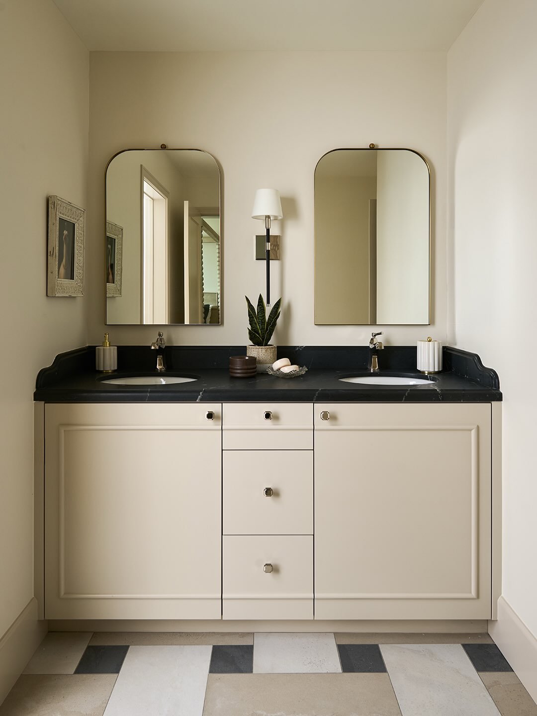 5 changes to look for in this before and after 

1. Remove soffit 
2. Move from a single sink to a double sink
3 paint baseboard trim to match cabinet 
4. Side splash details
5. Oversized basket weave tile pattern in a 12x24 size with 6&rdquo; dots