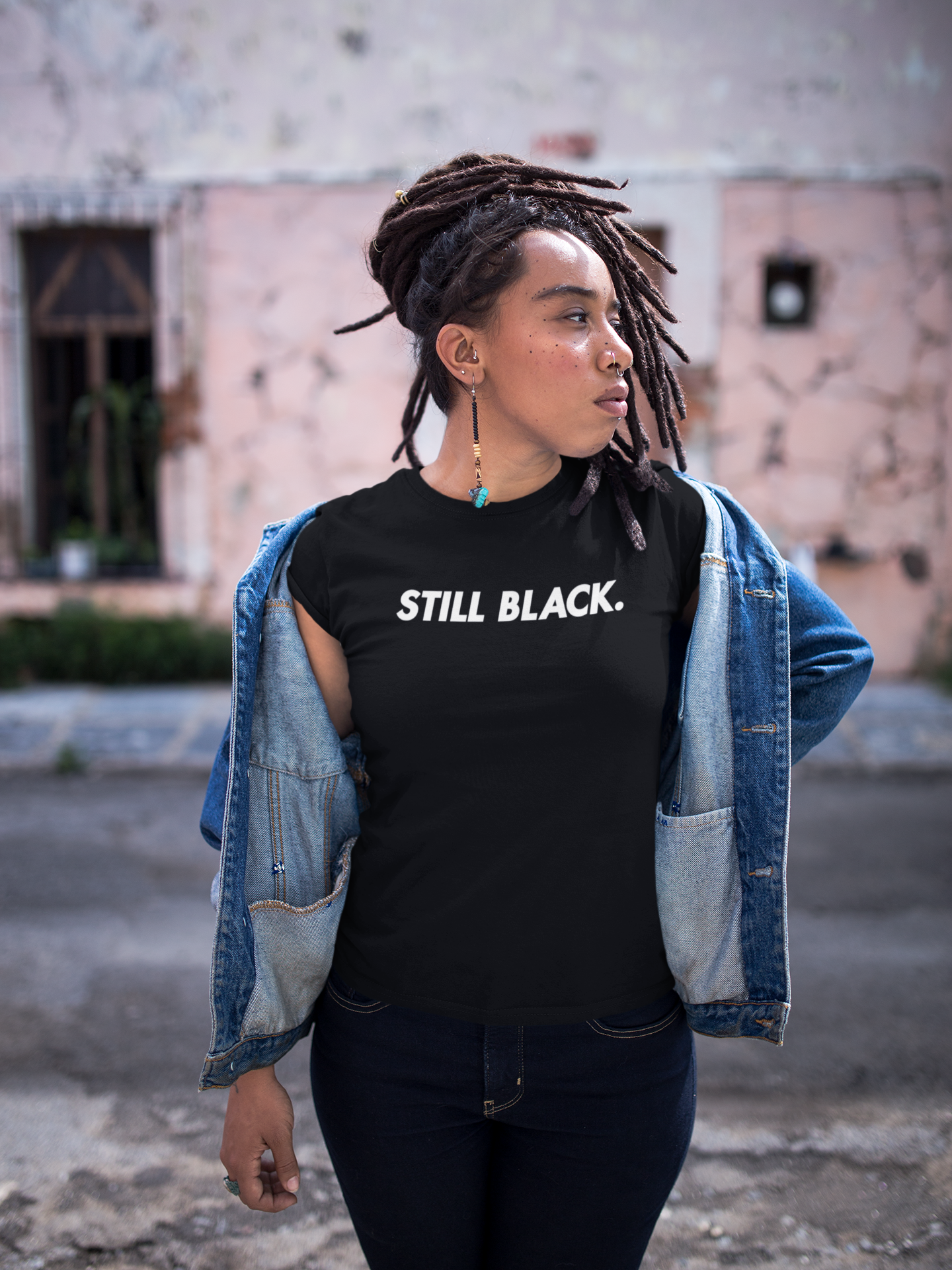 mockup-of-a-girl-with-locks-wearing-a-t-shirt-while-looking-to-the-side-a17140.png