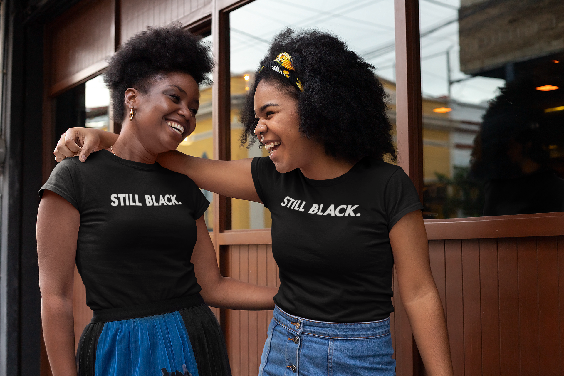 mockup-of-two-friends-with-t-shirts-chatting-outside-a-bar-32303.png