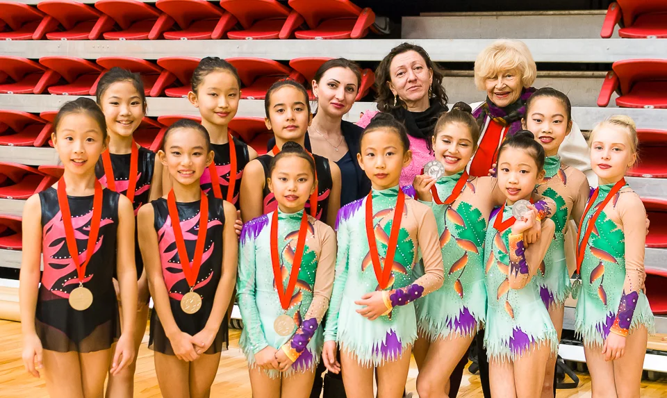 Tonya and Valeria coaches with Mrs. Koop and their rope and ball group 