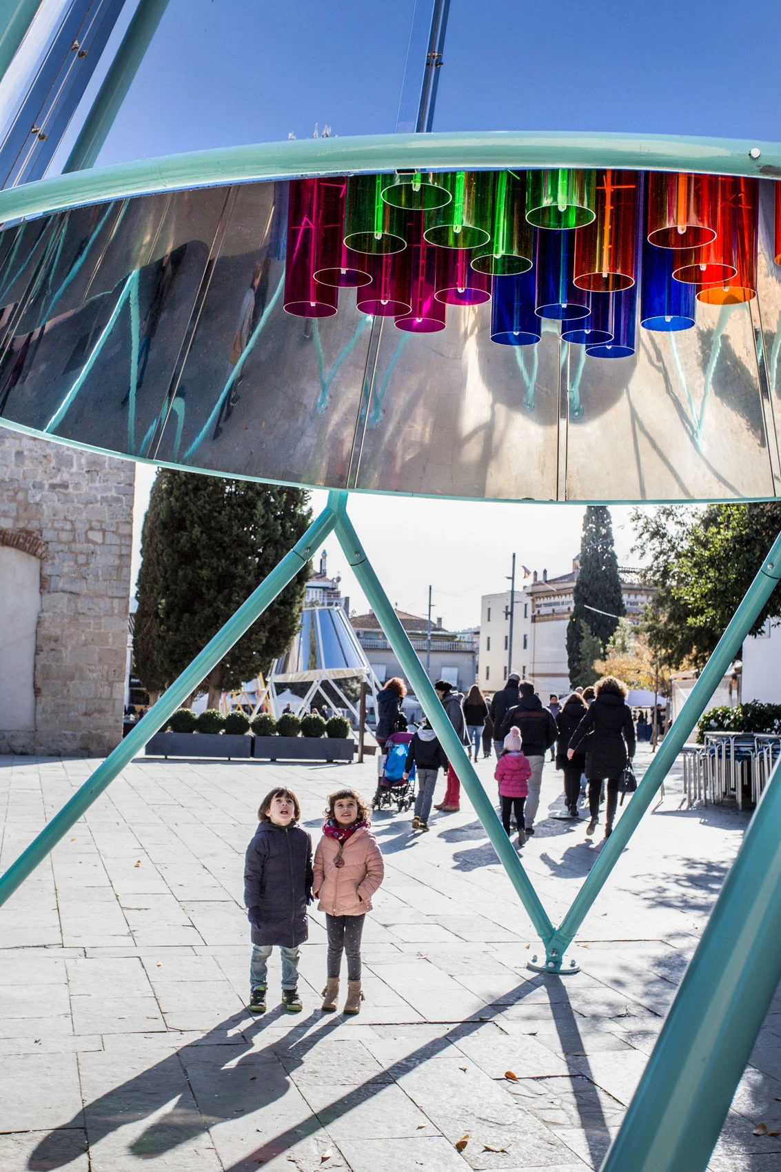 Bell #3 Xylophone The blue bell acts as a giant interactive musical instrument, that captures the movements of the people, and transforms them into light and sound impulses, both amplified by the envolving mirror steel bell.