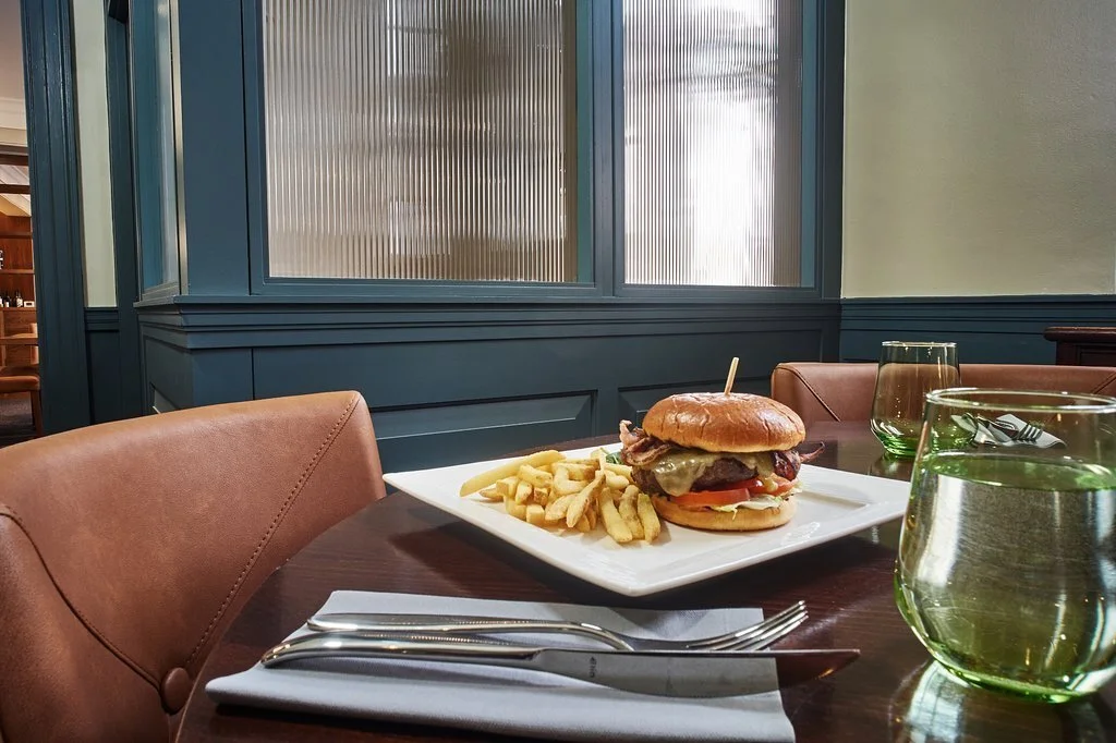 Chequers Hotel dining table detail - project management, quantity surveying and cdm services