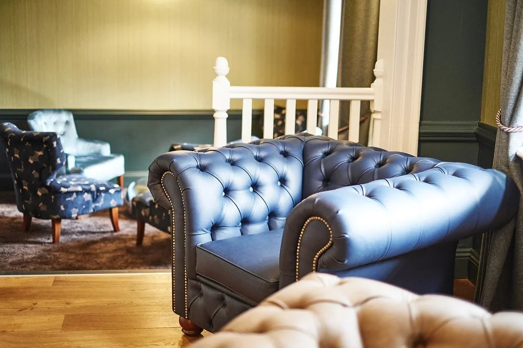 Chequers Hotel bar armchair detail - project management, quantity surveying and cdm services