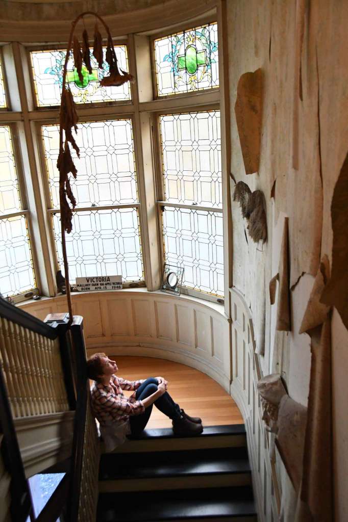 Cynthia Quinn at staircase landing. Photo by Bradley E. Clift.&nbsp;