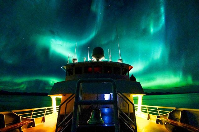 Photo by @wildhopemarkham with inspiration and help from @jonathankingston // The northern lights dance over the bridge of the National Geographic Sea Bird as she travels the inside passage of Southeast Alaska.

#natgeoexpeditions #alaska