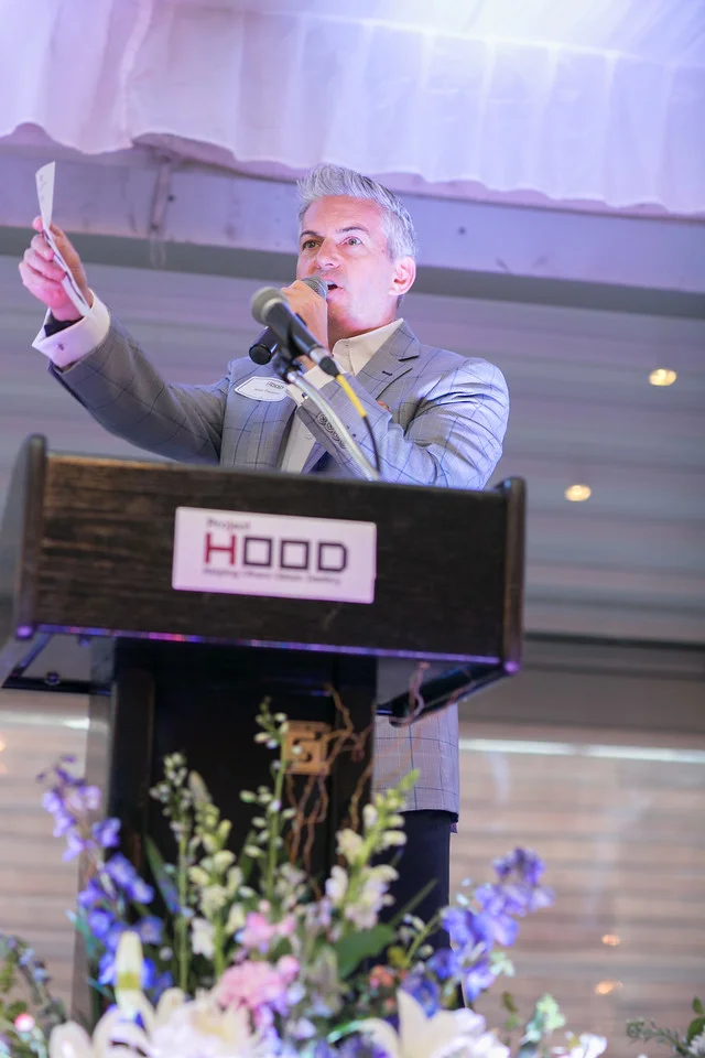 The fun and lively auctioneer was Michael D. Paulsen, Senior Vice President of Lockton Companies.