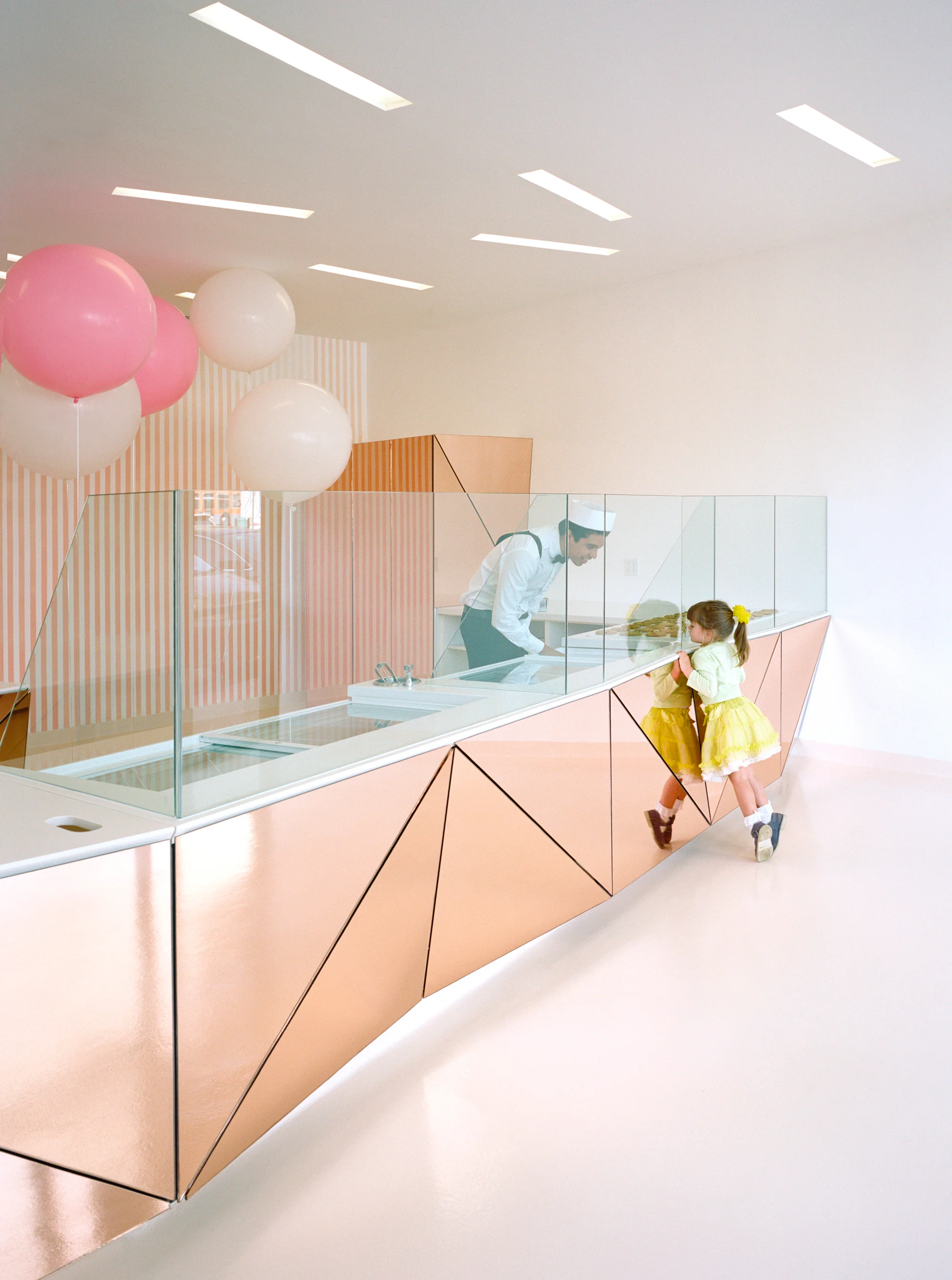View of the mirror clad ice cream counter.