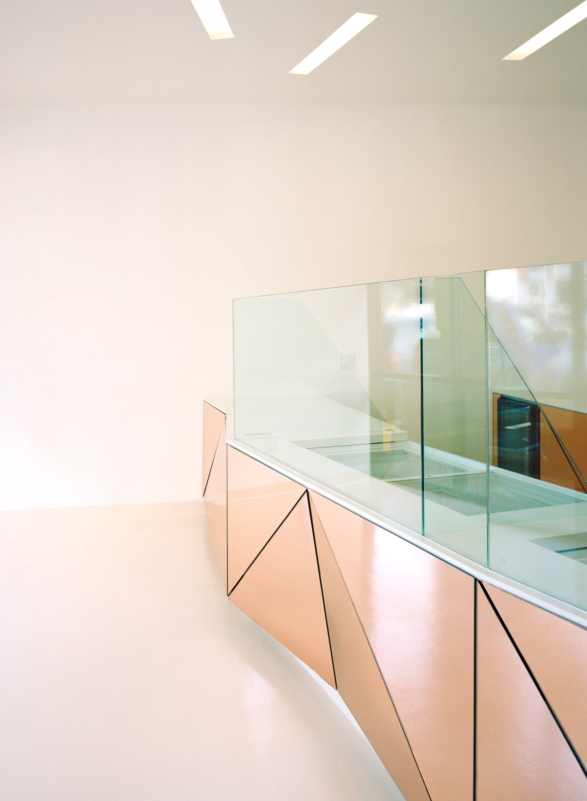 The floors were finished with a durable epoxy resin that give the space a soft, playful feel while be is easy maintain.