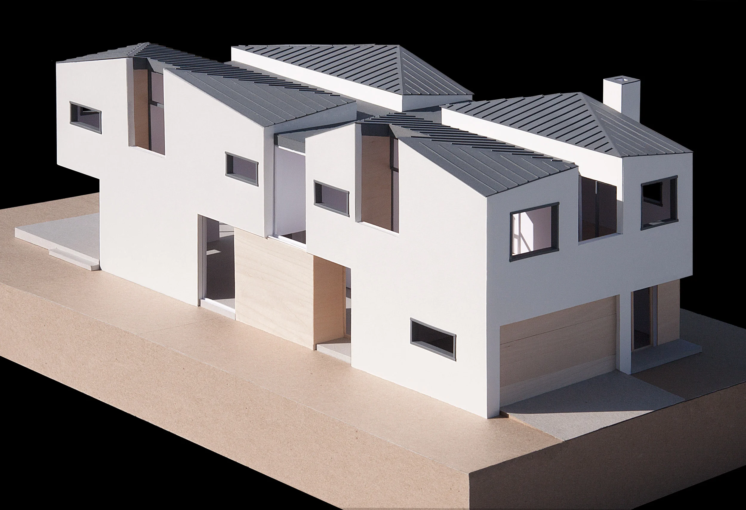 Aerial view showing the flat roof that divides the house into four quadrants - each with uniquely vaulted ceiling. 