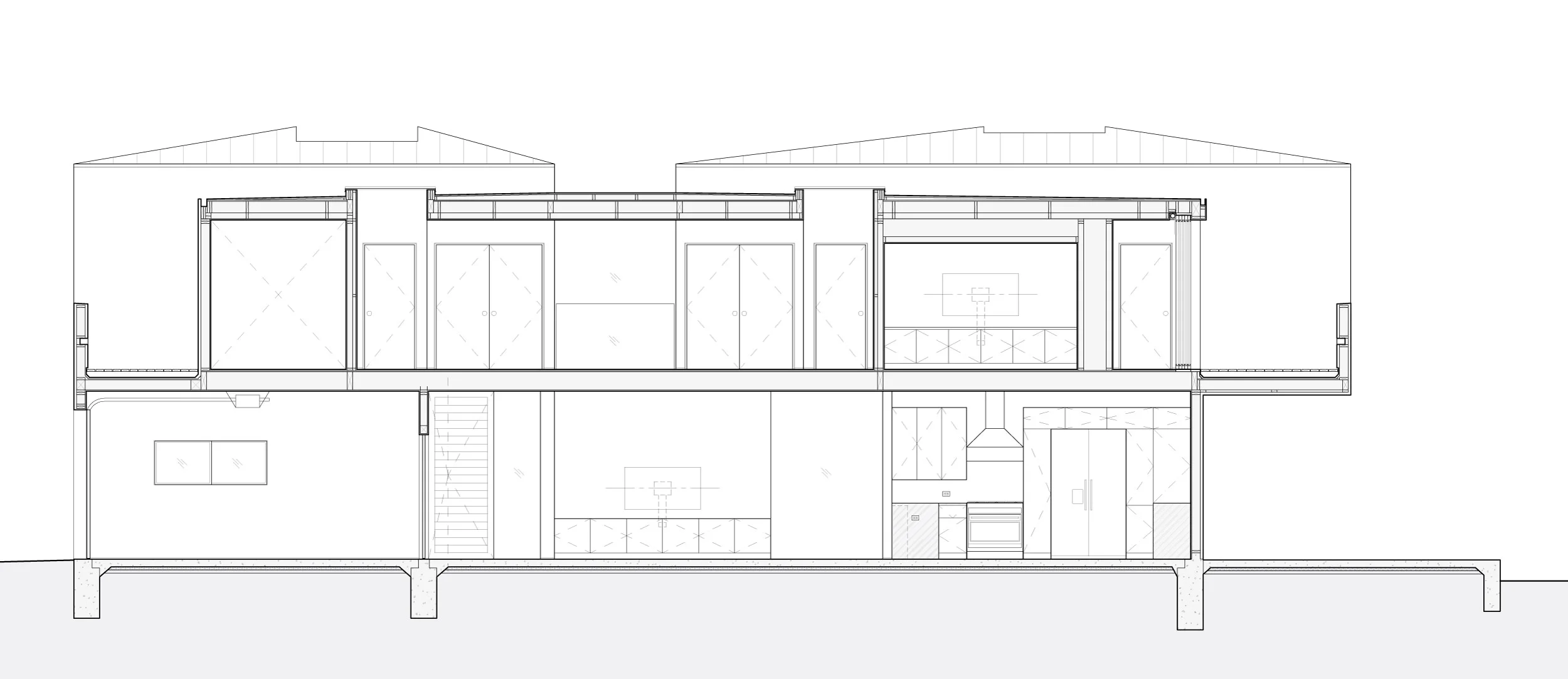 Longitudinal section through the flat roof hall that connects the bedrooms.