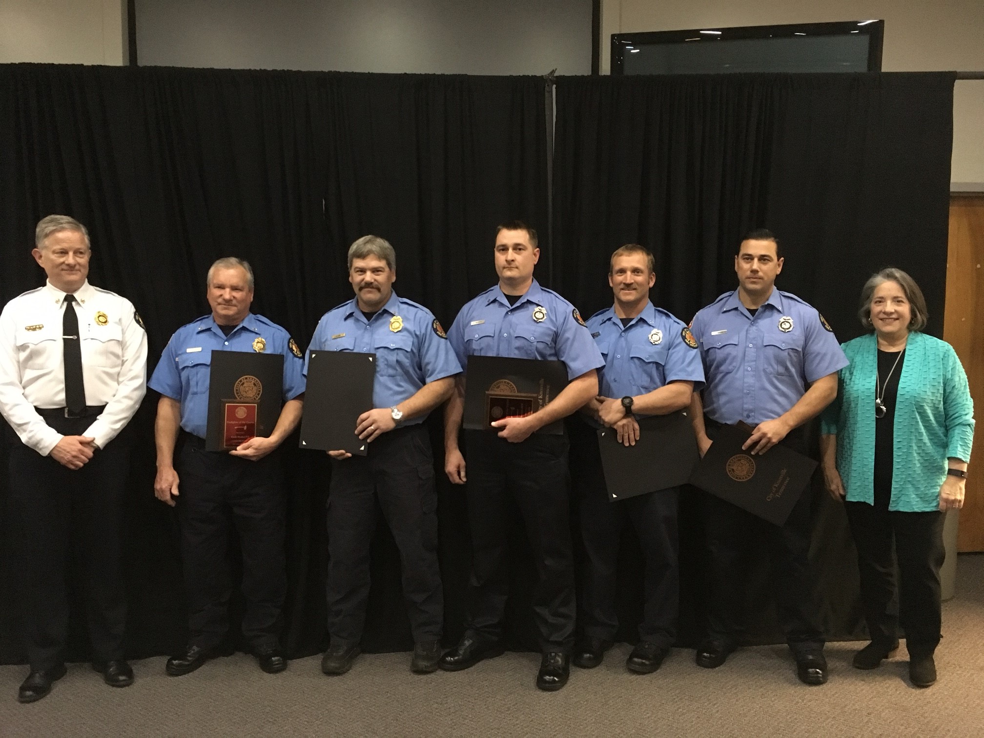 From left: Chief Stan Sharp, Capt. Cecil Risden, Capt. Jack Lay, Master Firefighter Matt Beavers, Master Firefighter Rusty Jenkins, Senior Firefighter Jacob Mason, and Mayor Madeline Rogero Photo courtesy of City of Knoxville