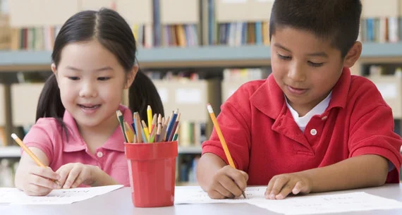 Two kids writing 2.jpg