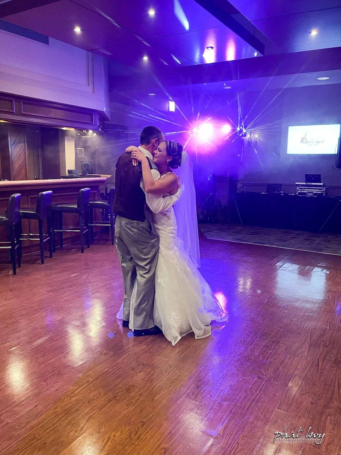 Bride and groom first dance with DJ lighting package at Pointe West Golf Club - Phat Boy Productions