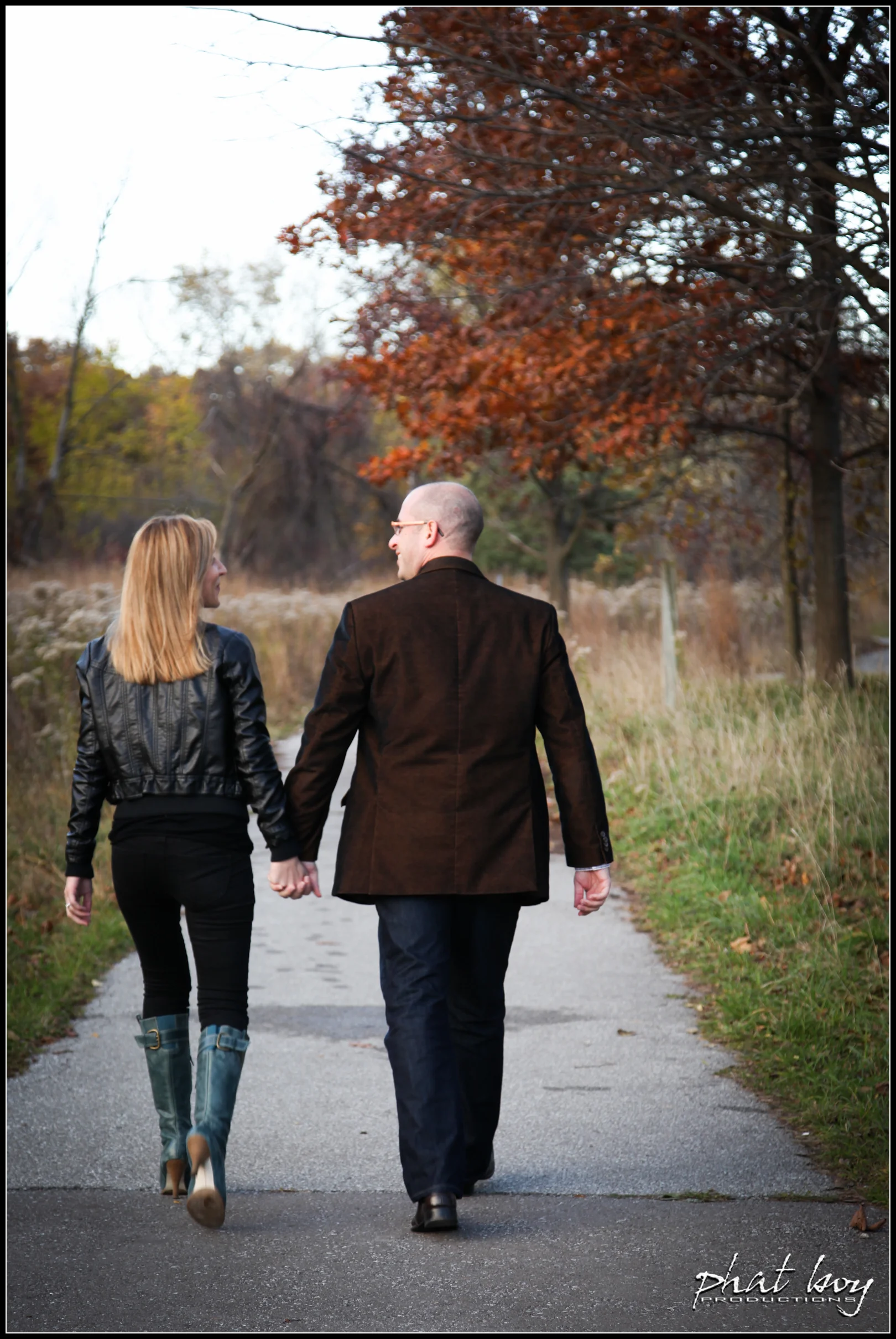 Mike__Julie_-_Engagement_Photos_WEB_EDITS_-_LOGO-1.jpg