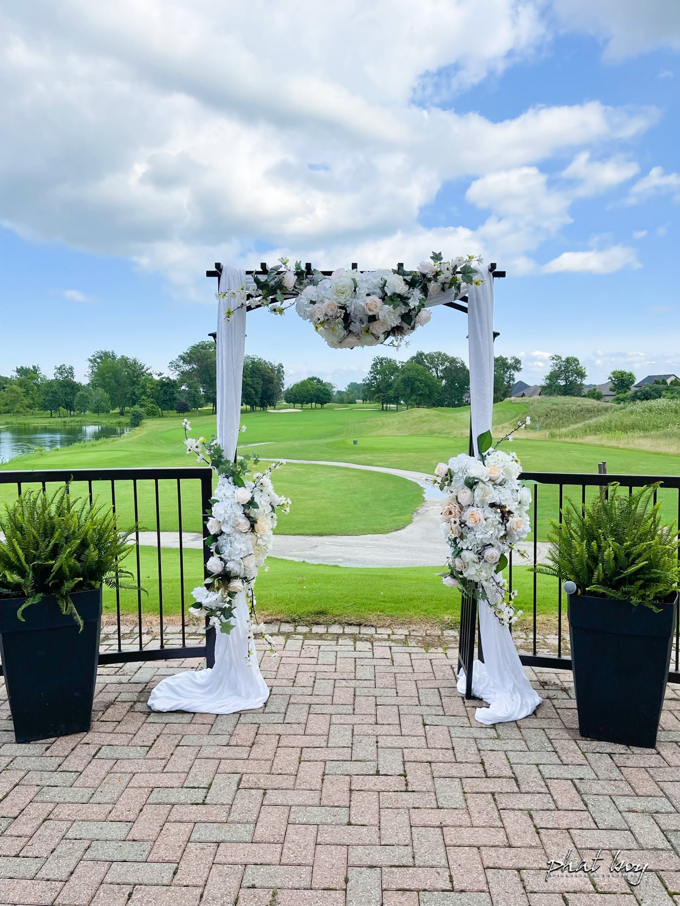 Ceremony Backdrop - Chiffon Fabric and Florals.jpeg