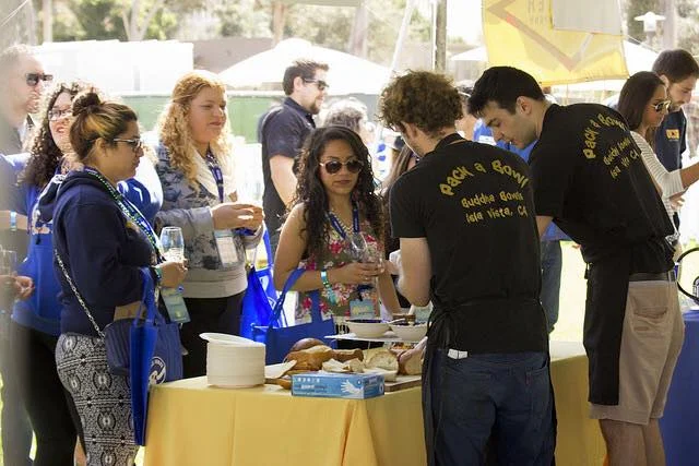  Daniel and Willy serving samples at the Taste of UCSB
