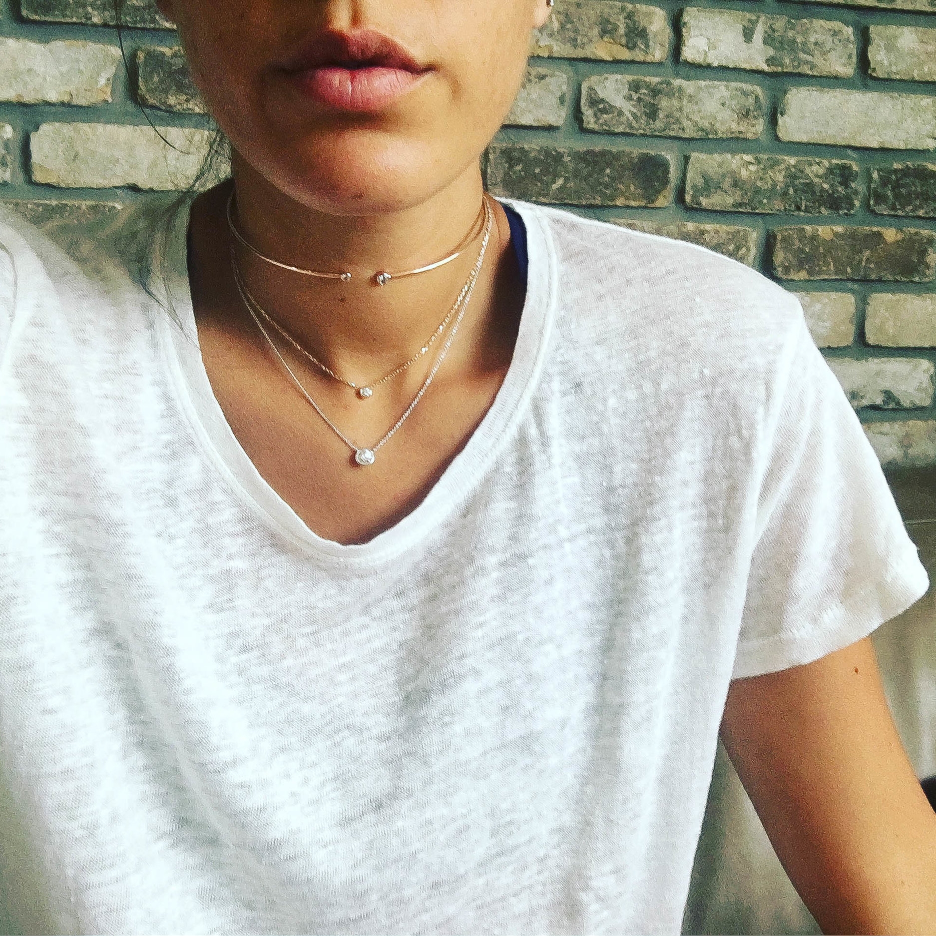 Danielle's Armor: Layering her diamond necklaces