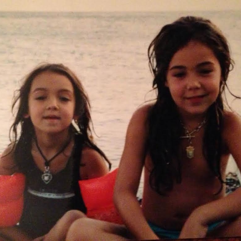 Oren (L) & Yarden (R) as children, wearing their chunky antique necklaces