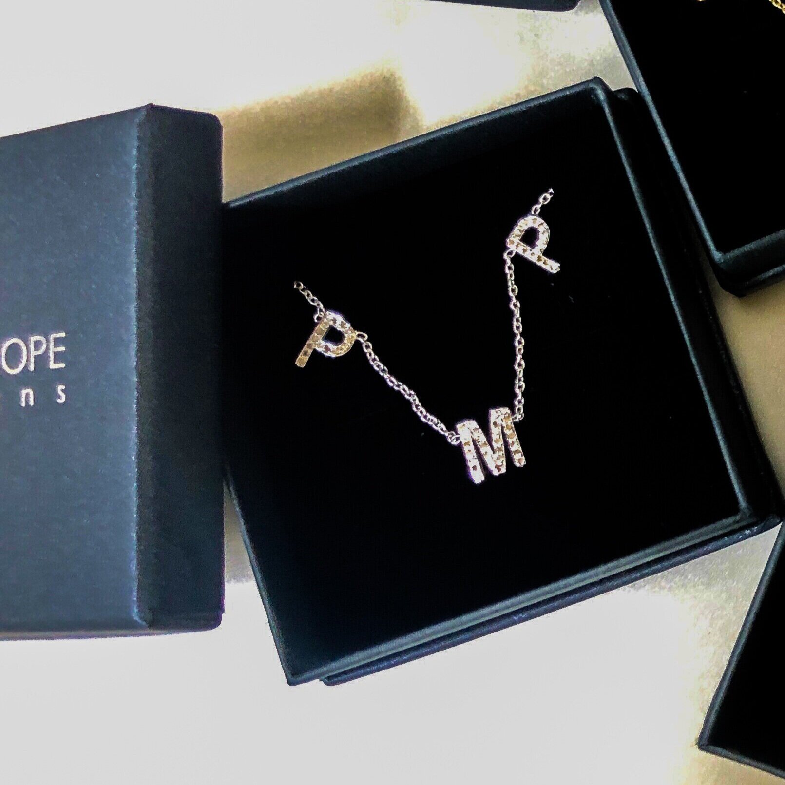 The best gift Kara has given recently: One of her initial necklaces to her friend Paige