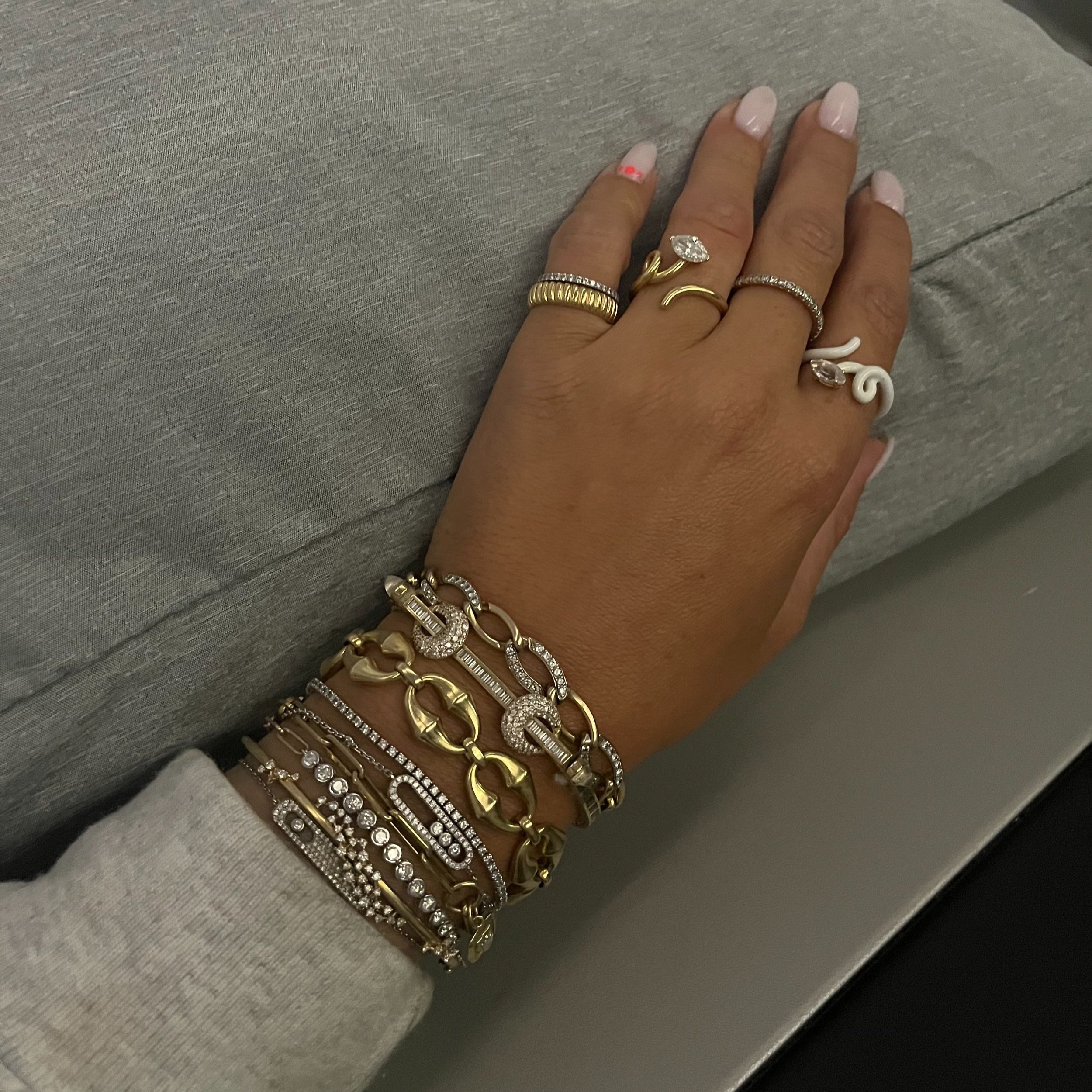 Jewelry that makes Francesca feel strongest: her bracelet stack featuring Ananya's Chakra bracelet