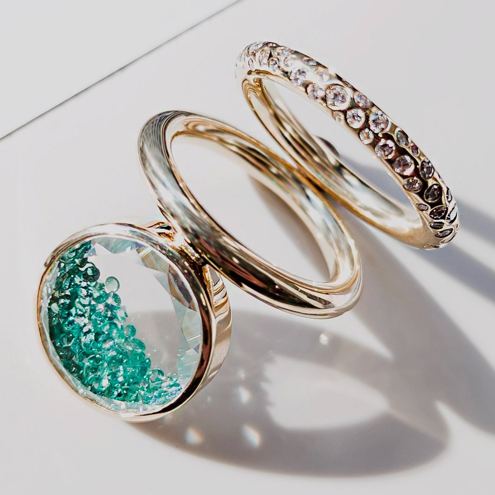 Moritz's newest collection featuring the Bambole Emerald Ring and the Circo Pavé Band