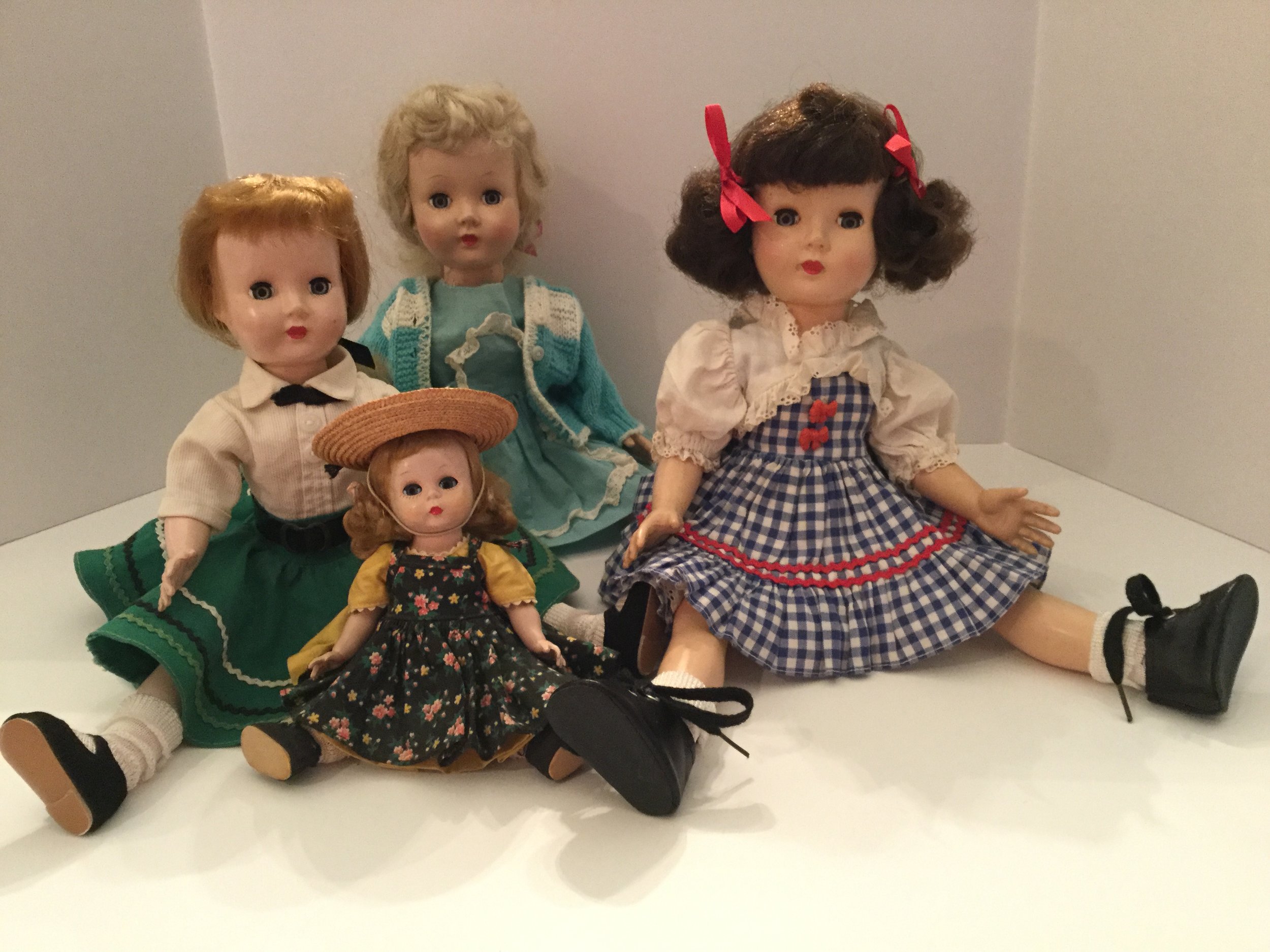 These are my 1950s (maybe even 1949) dolls ... two were mine and two were collected.