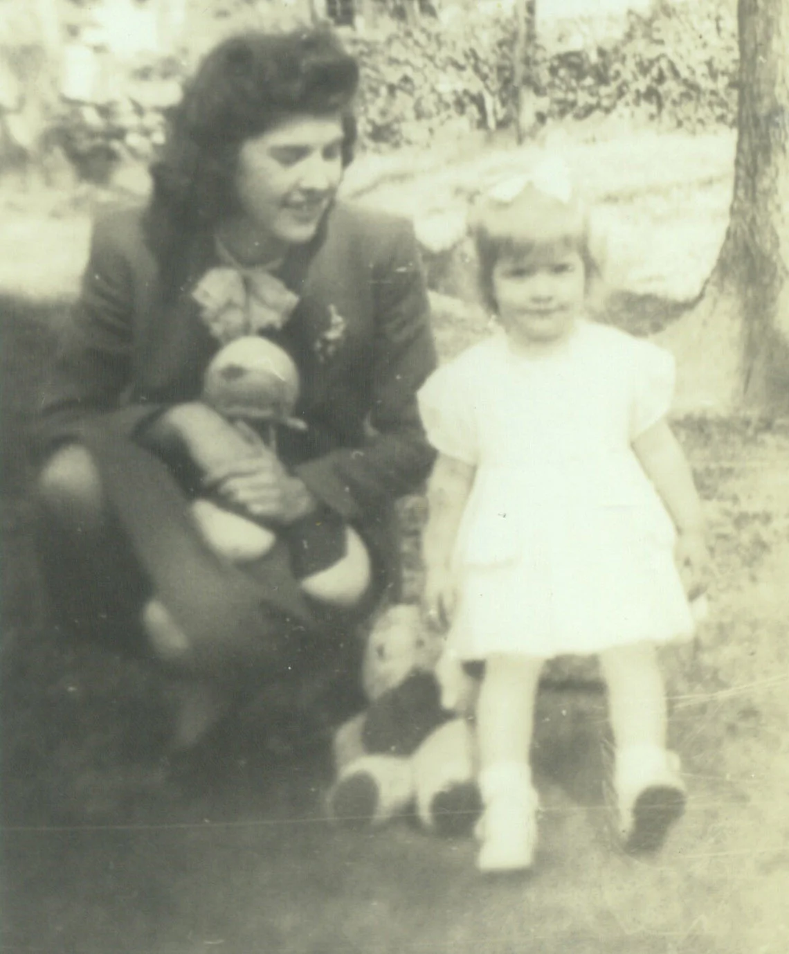 My mother and I in 1945 with the rag doll and my teddy bear.